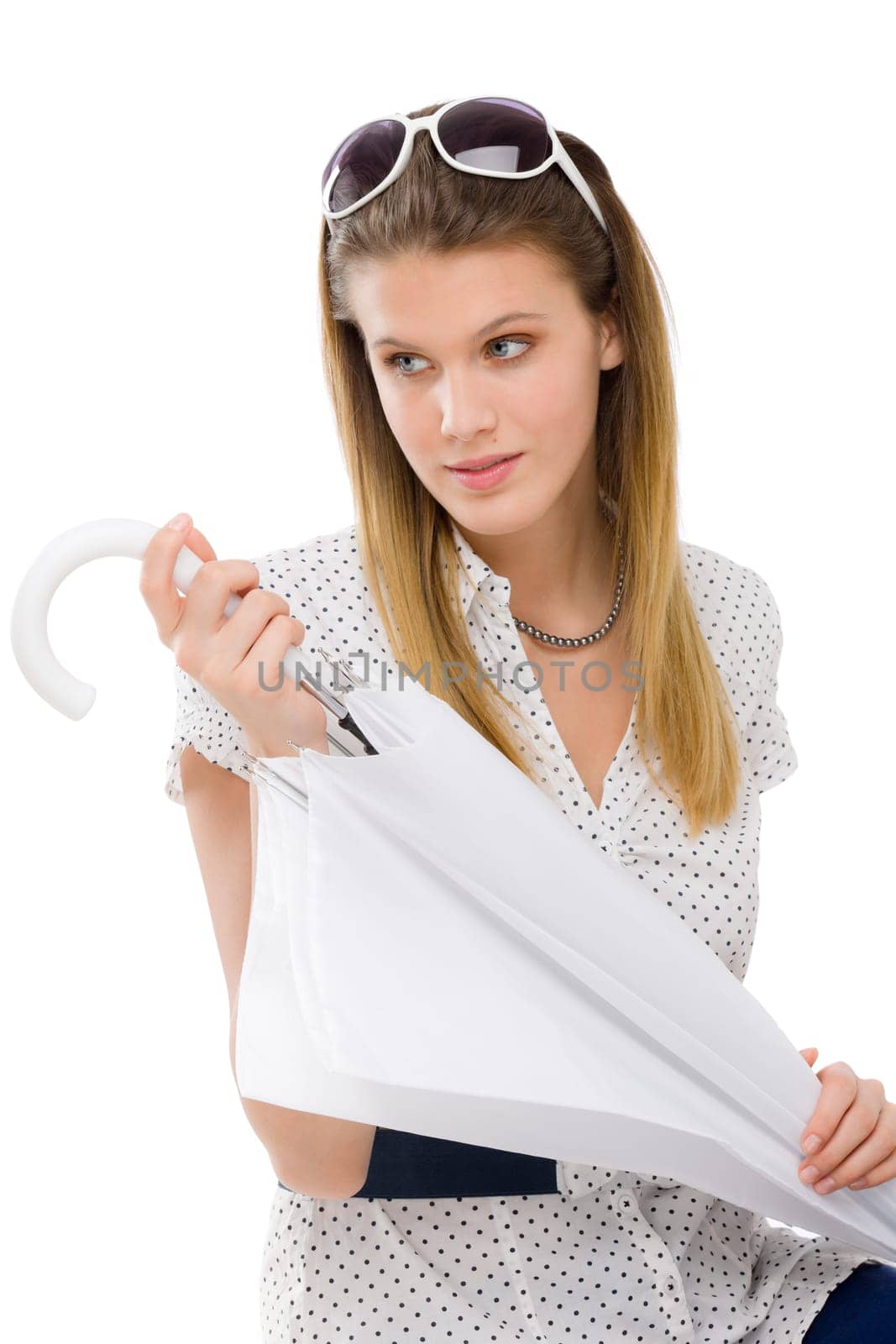 Fashion model - young woman hold umbrella in summer designer clothes