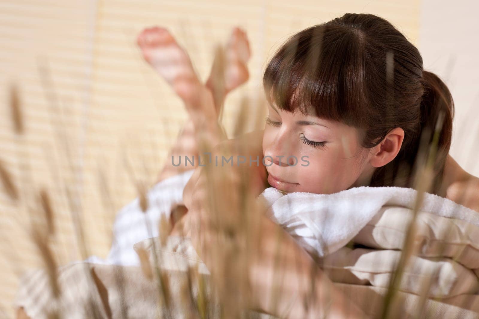 Spa - Young woman at wellness therapy waiting for massage