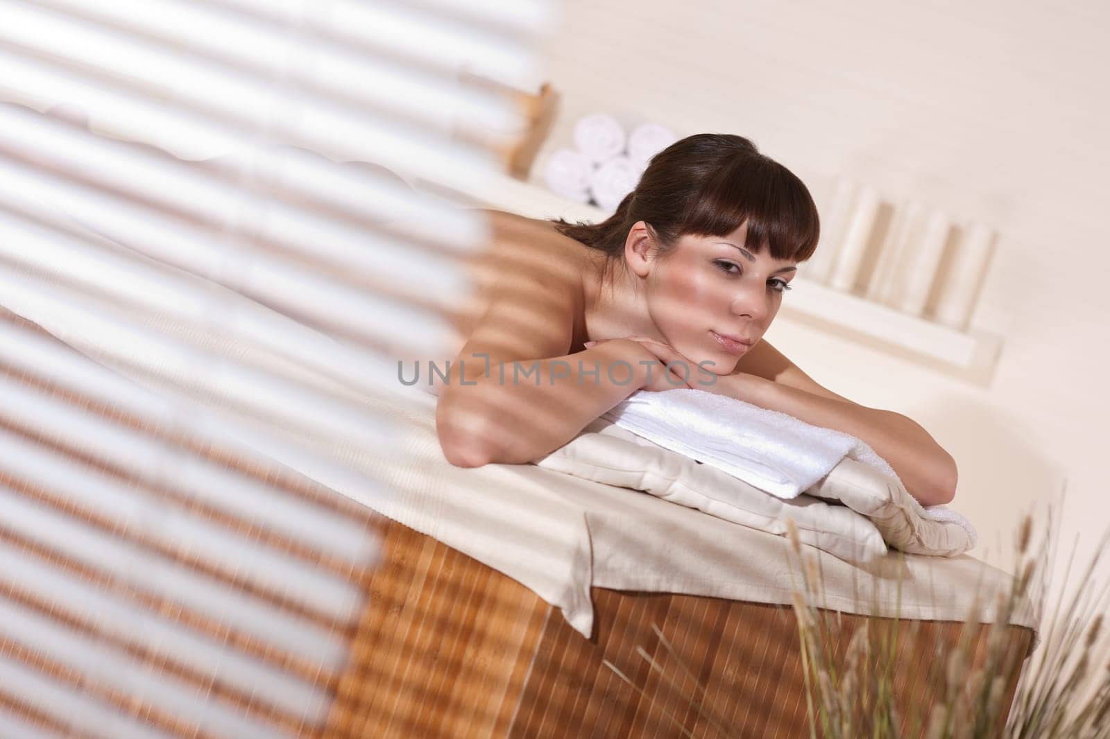 Spa - Young woman at wellness therapy enjoy massage