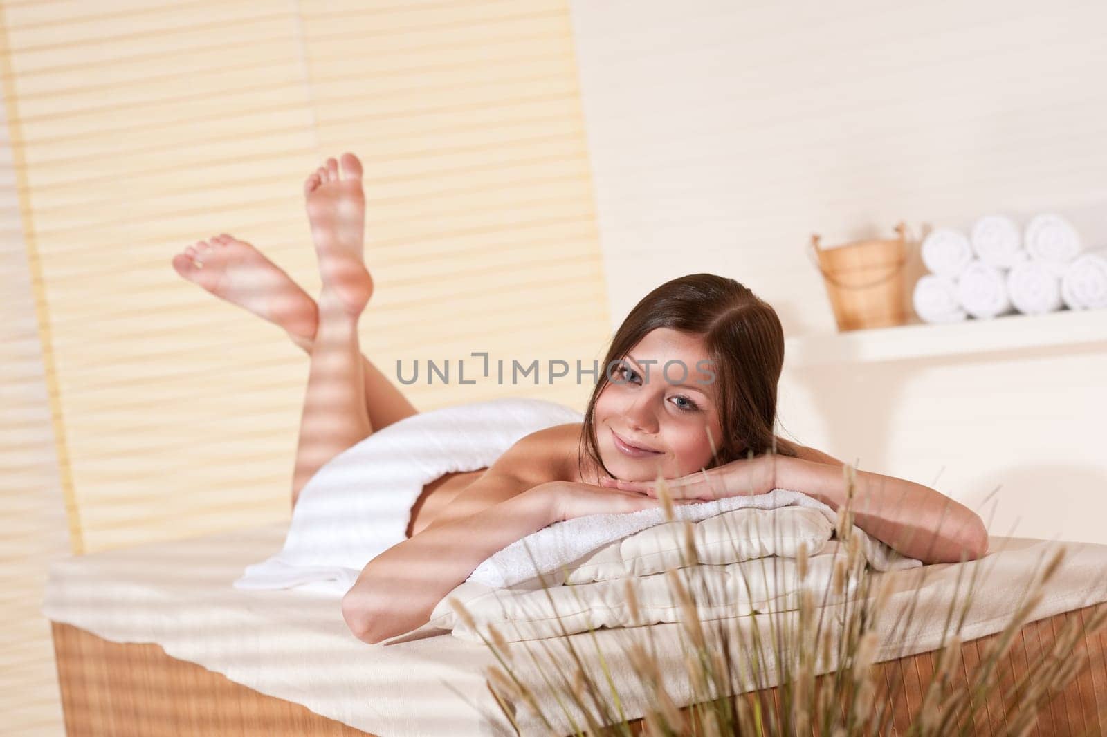 Spa - Young woman at wellness therapy waiting for massage