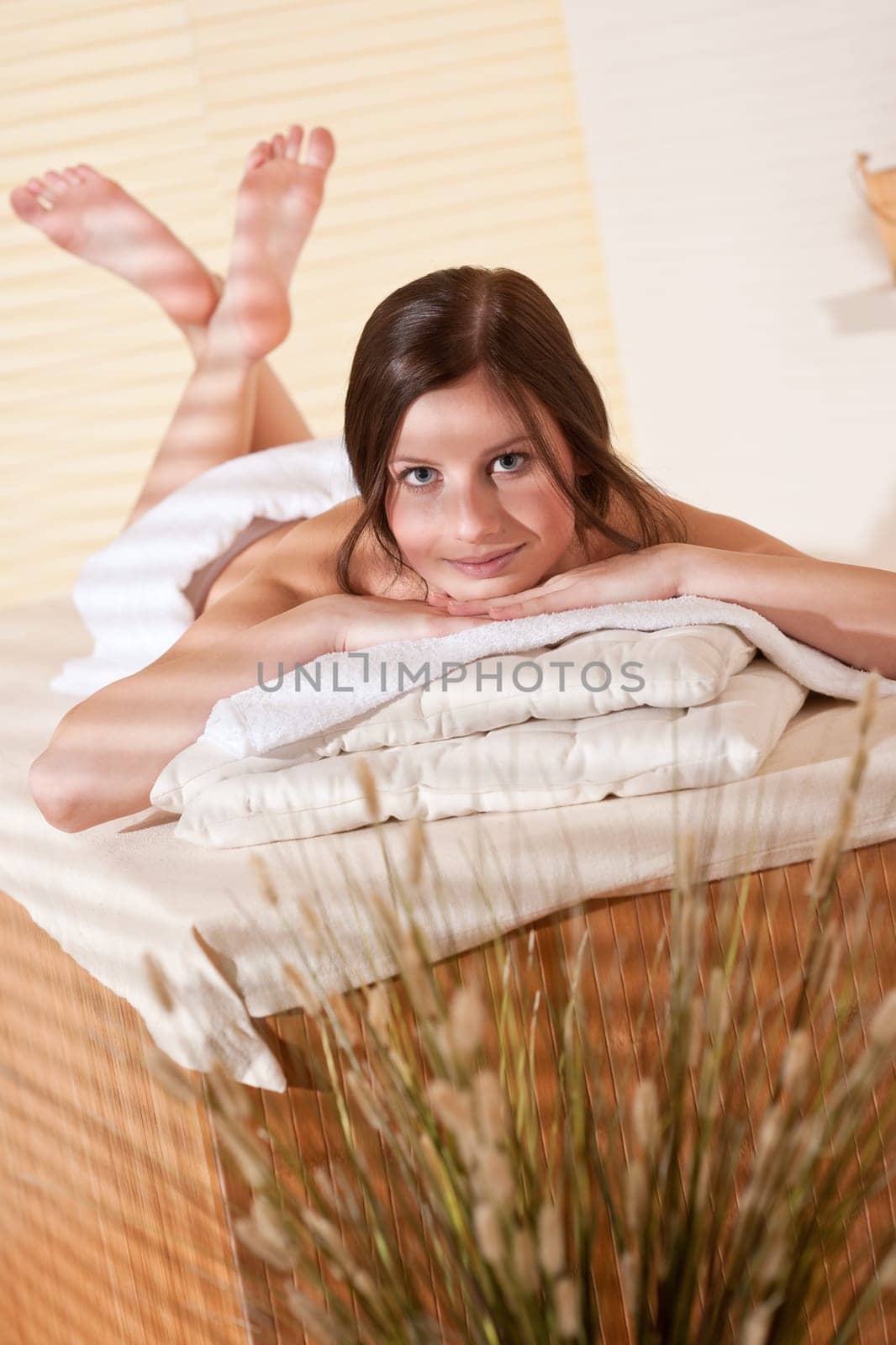 Spa - Young woman at wellness therapy waiting for massage