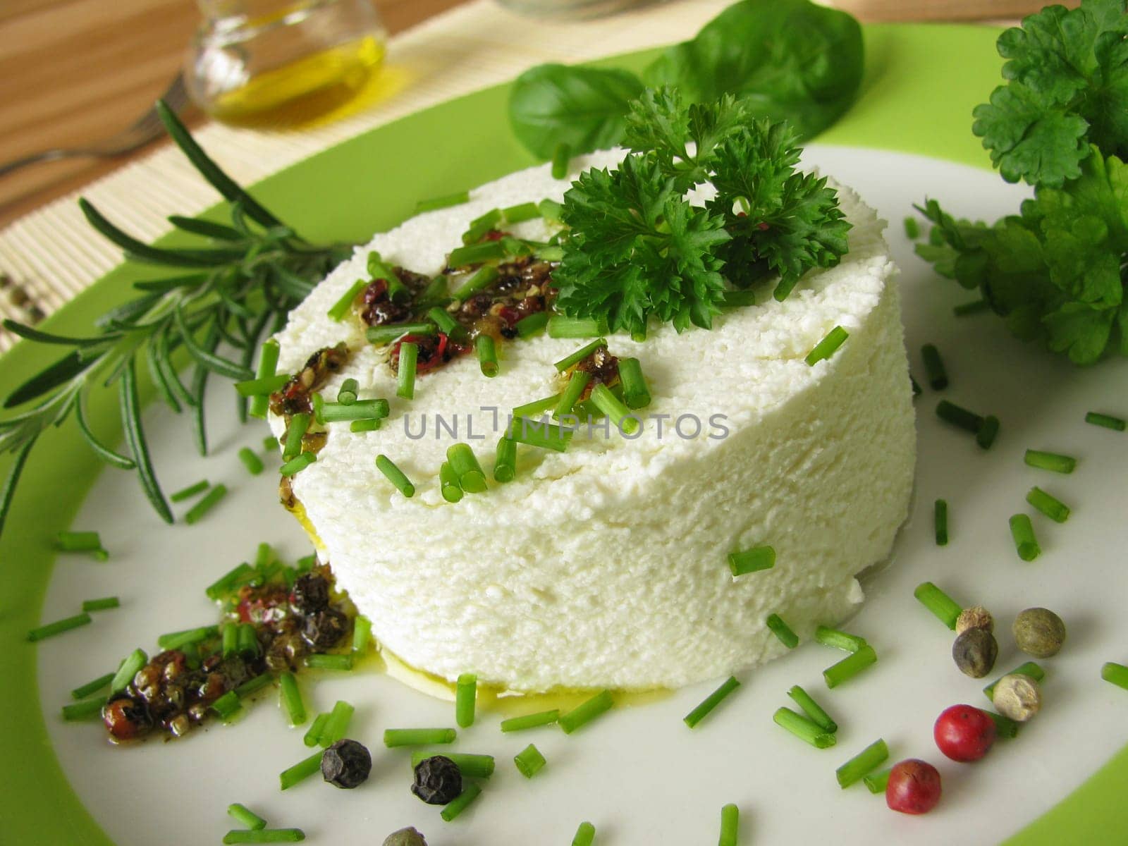 Goat's cream cheese with herb marinade and pepper