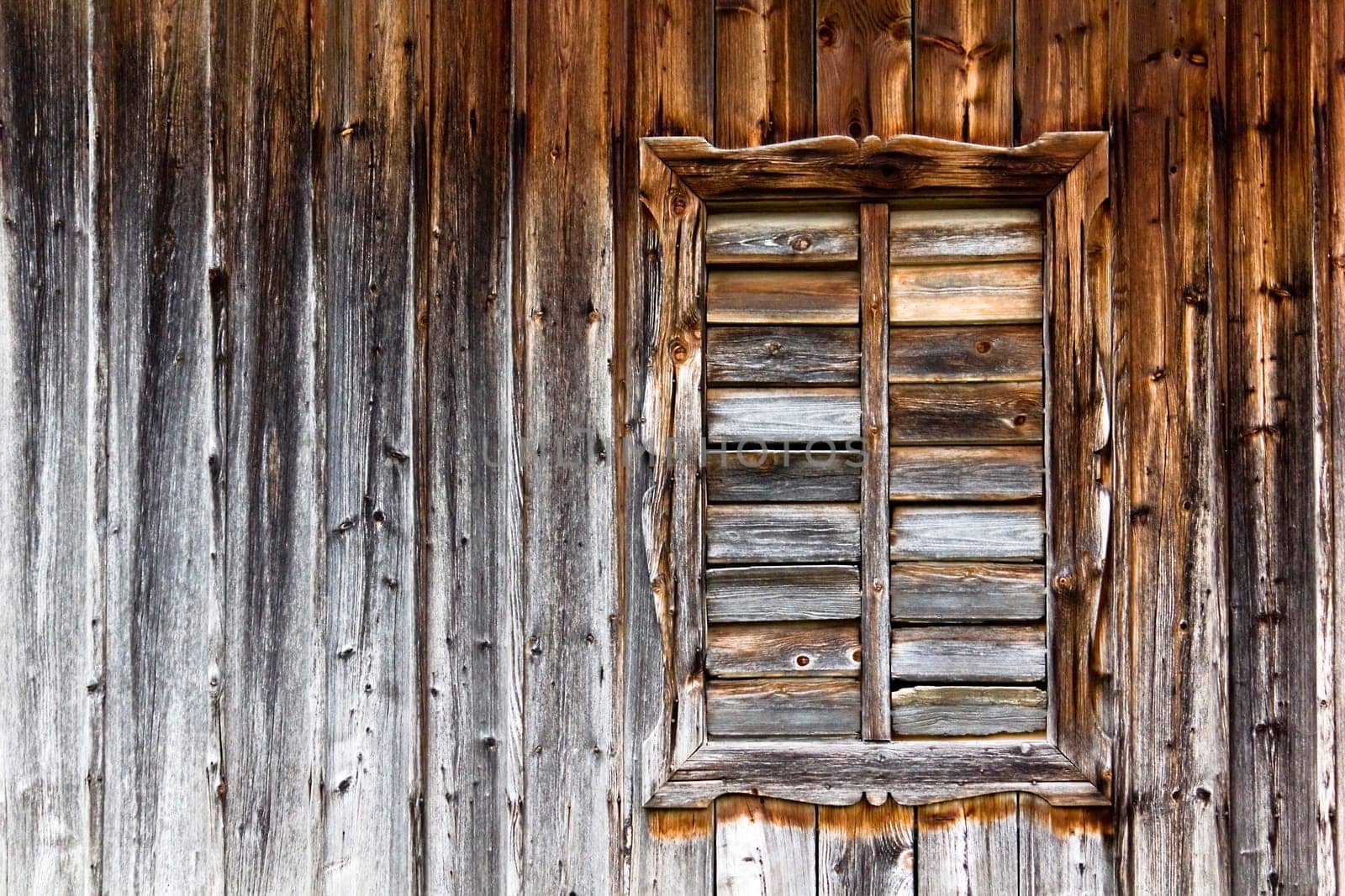 Old wooden hut with window