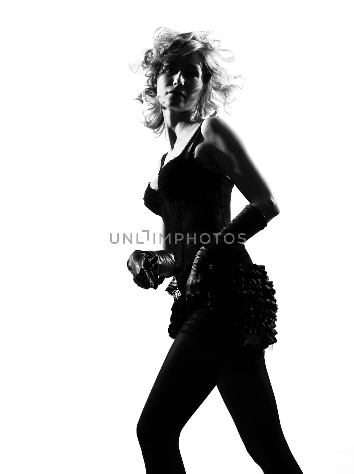 stylish silhouette caucasian beautiful woman sexy  attitude adusting mini skirt behavior clothes full length on studio isolated white background