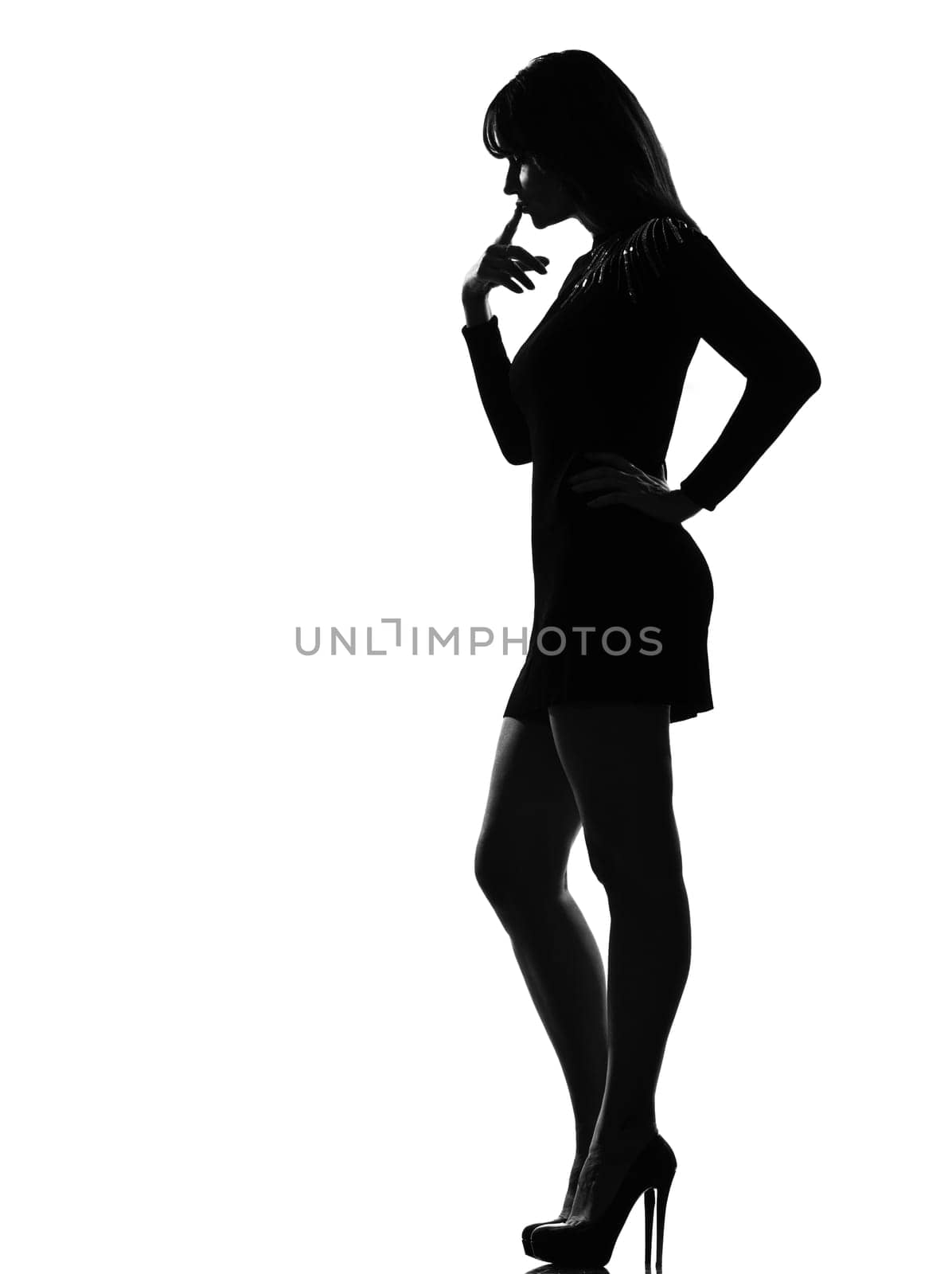 stylish silhouette caucasian beautiful woman full length thinking pensive on studio isolated white background
