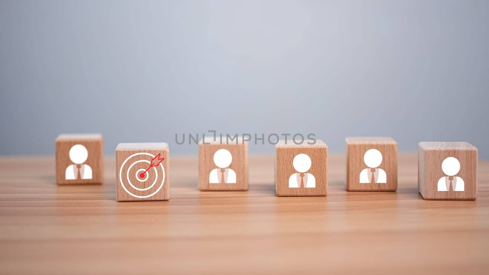 wooden block which prints a target icon and business symbol on white background. Business goals and objectives concept. business competition. business target concept. by Unimages2527