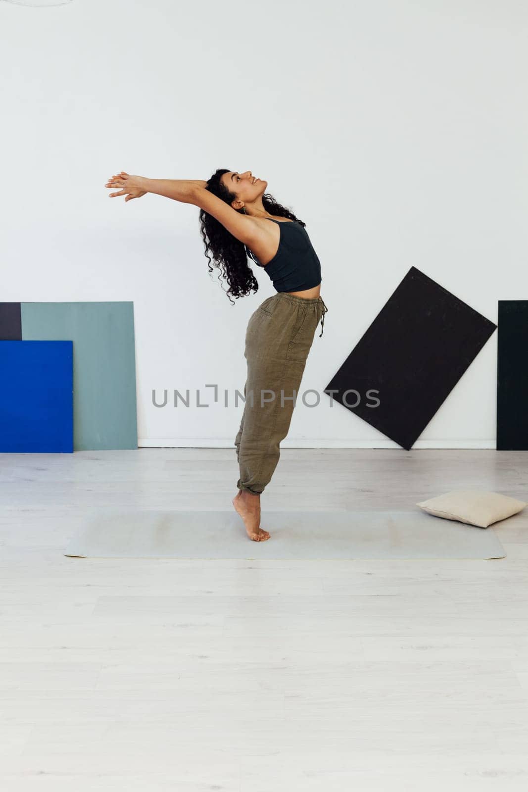 yoga asana shavasana woman doing exercises lotus pose workout in studio