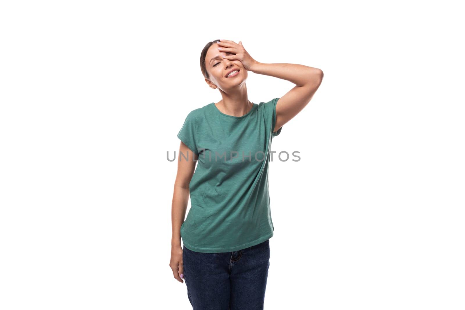 attractive young caucasian woman in t-shirt posing on white background with copy space.