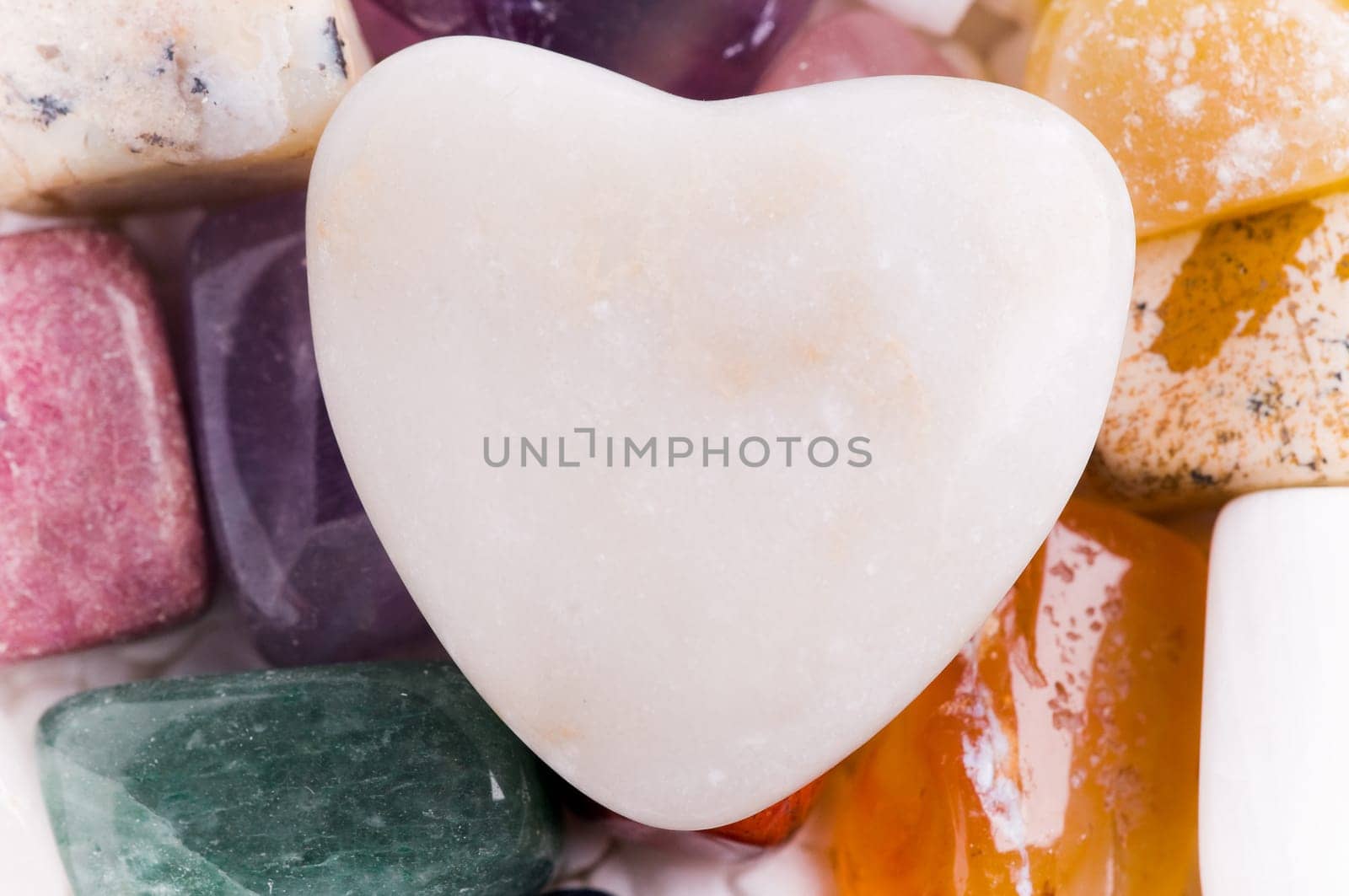 Heart with various natural stones in beautiful colors
