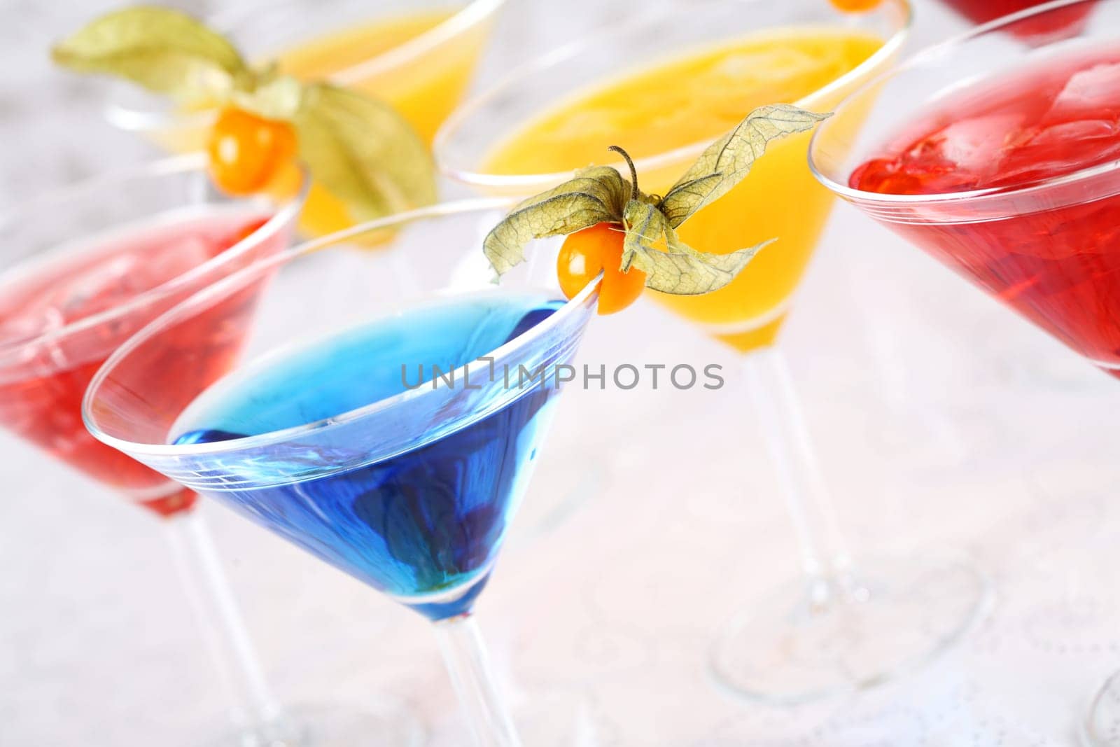 Delicious coctails garnished with fruits