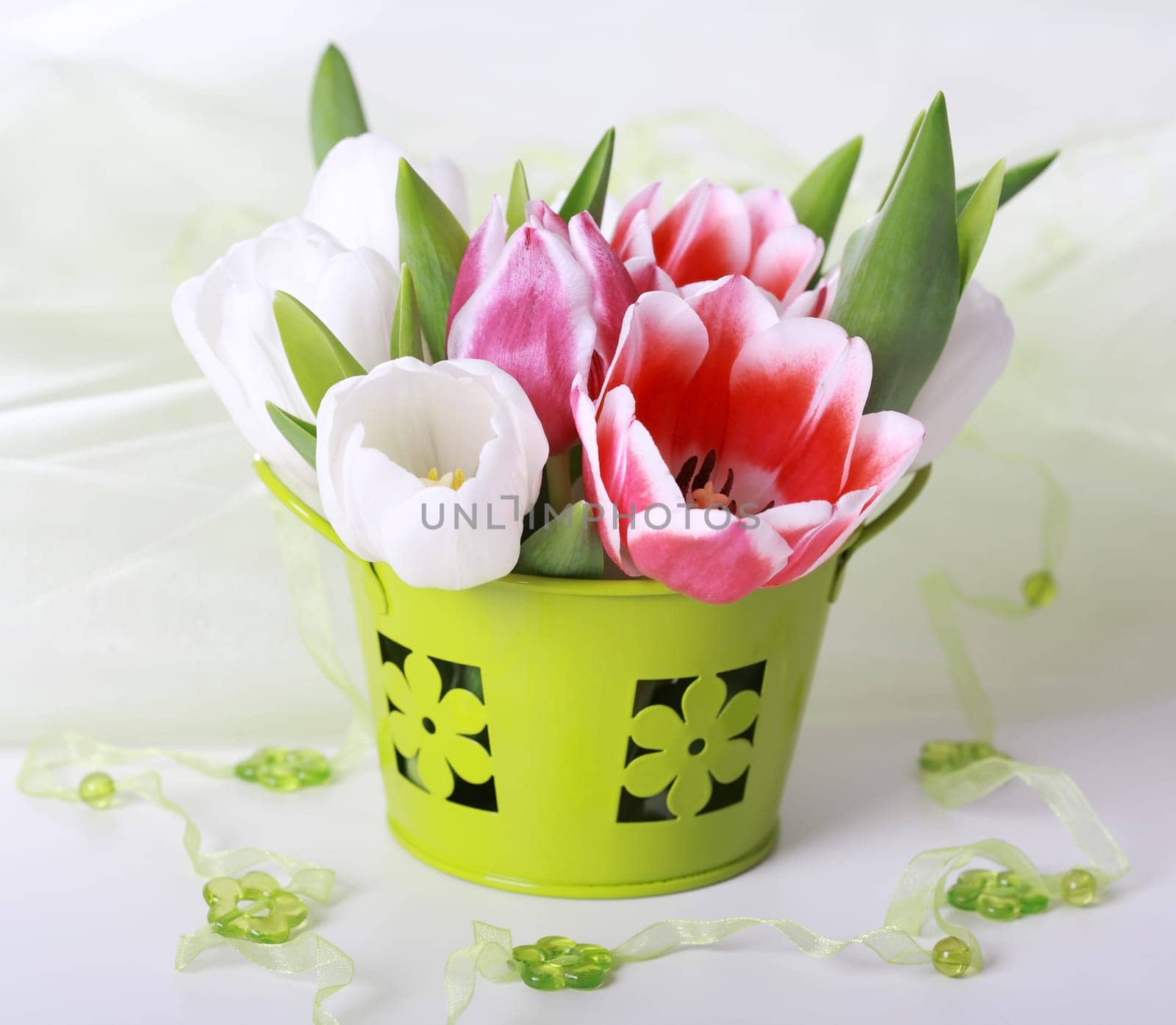 Easter eggs with tulips for spring table decoration