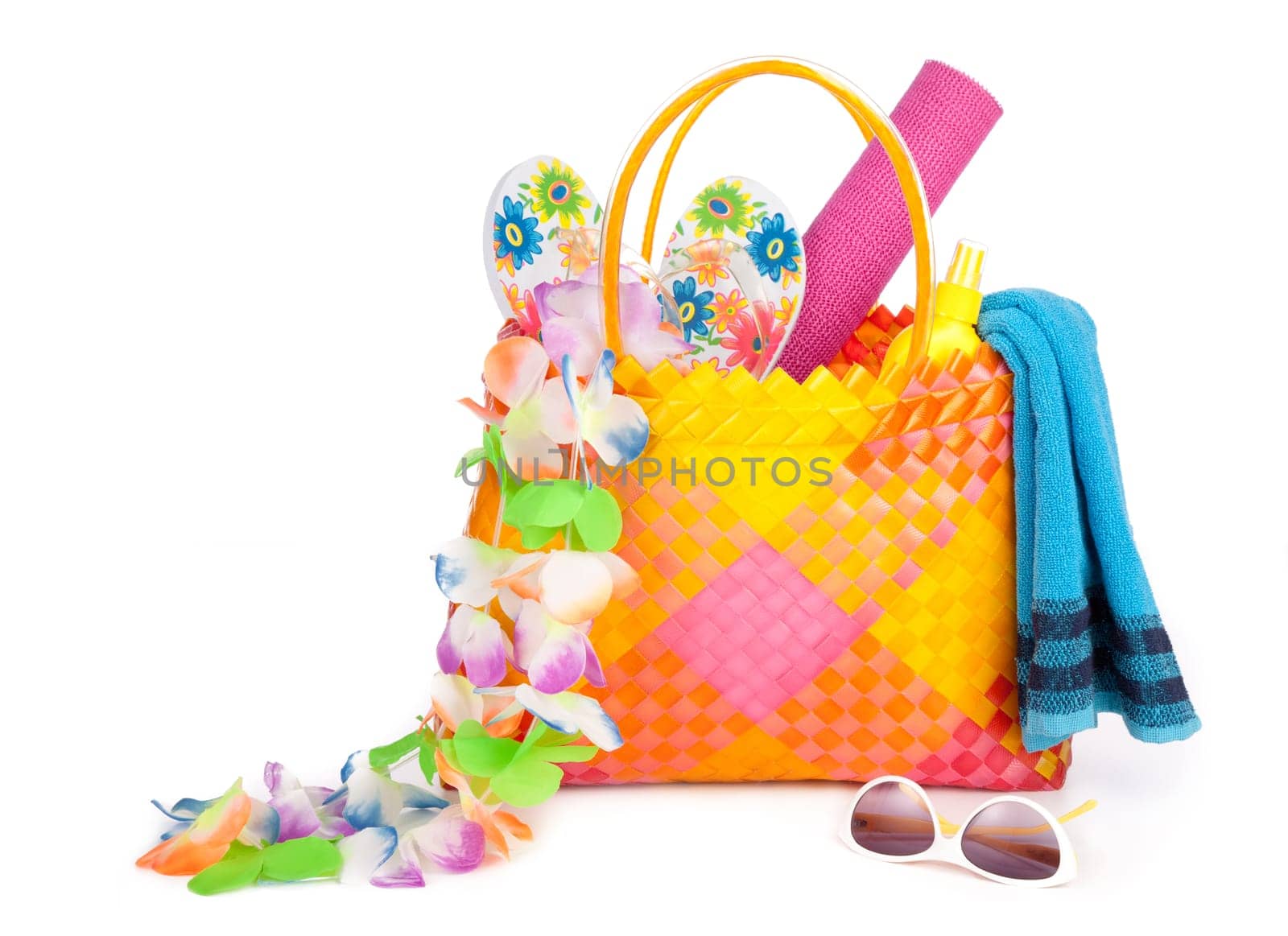 beach bag with towel sunglasses flip-flops and hat.isolated on white