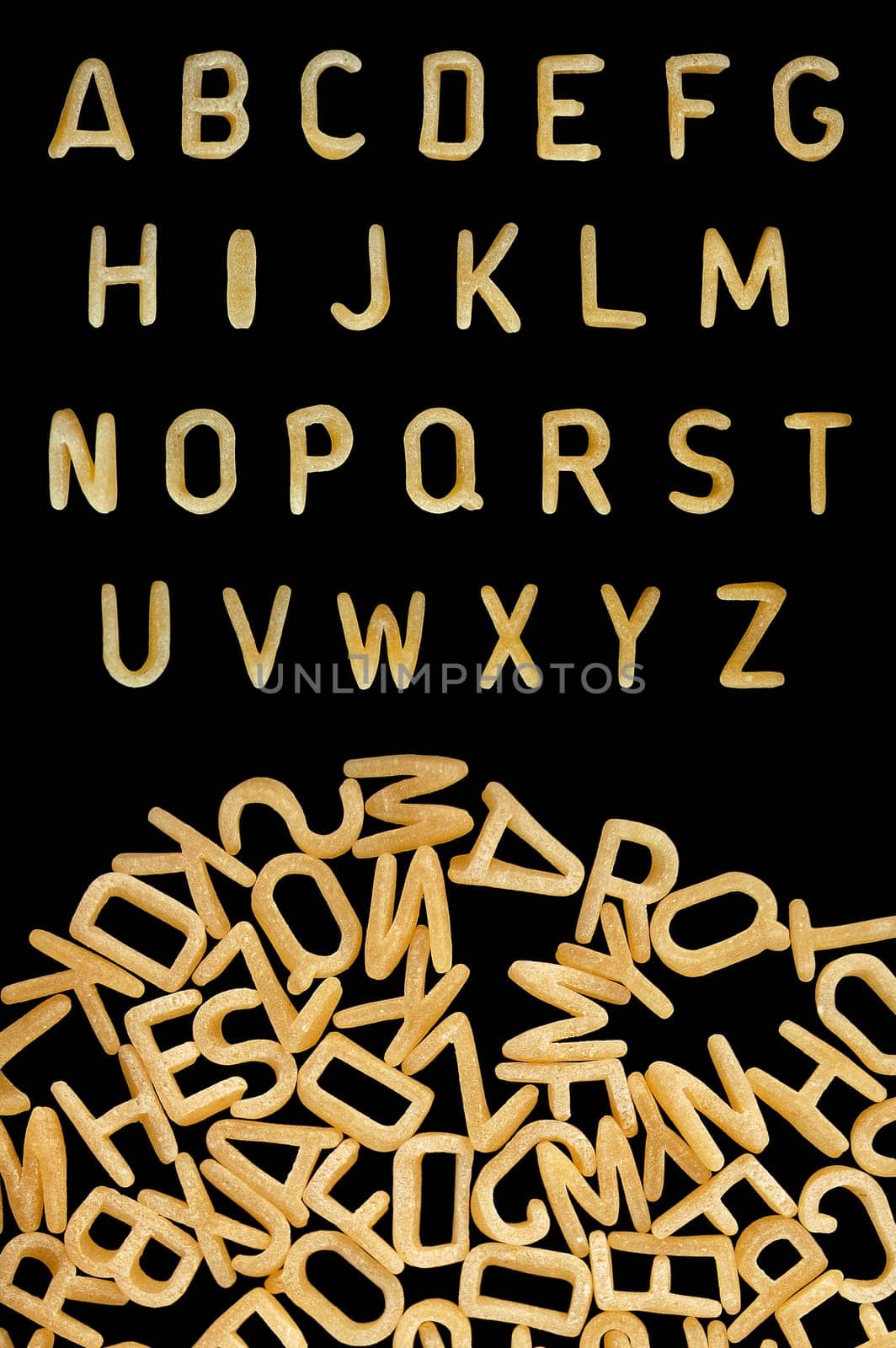 Alphabet soup pasta font. Kids food background.