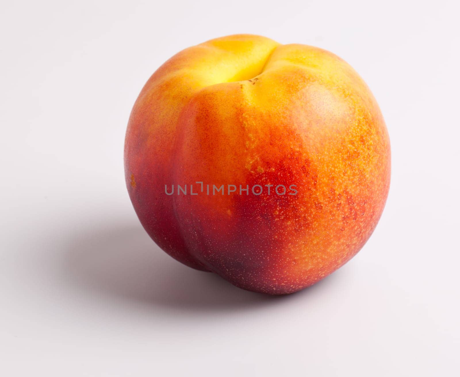Single Nectarine on White Background