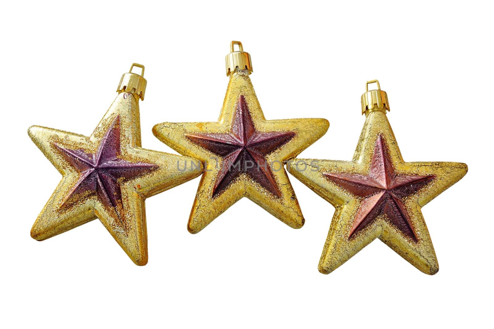 Christmas golden star baubles on white background. Seasonal decoration.