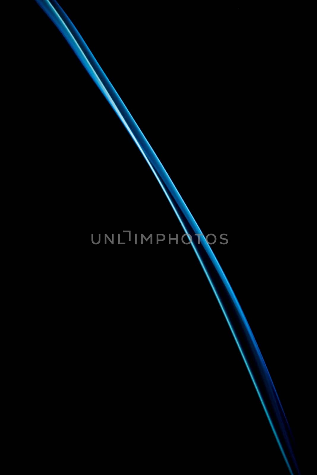 beautiful patterns created with the smoke of a bar of inciense and colorized over a black background