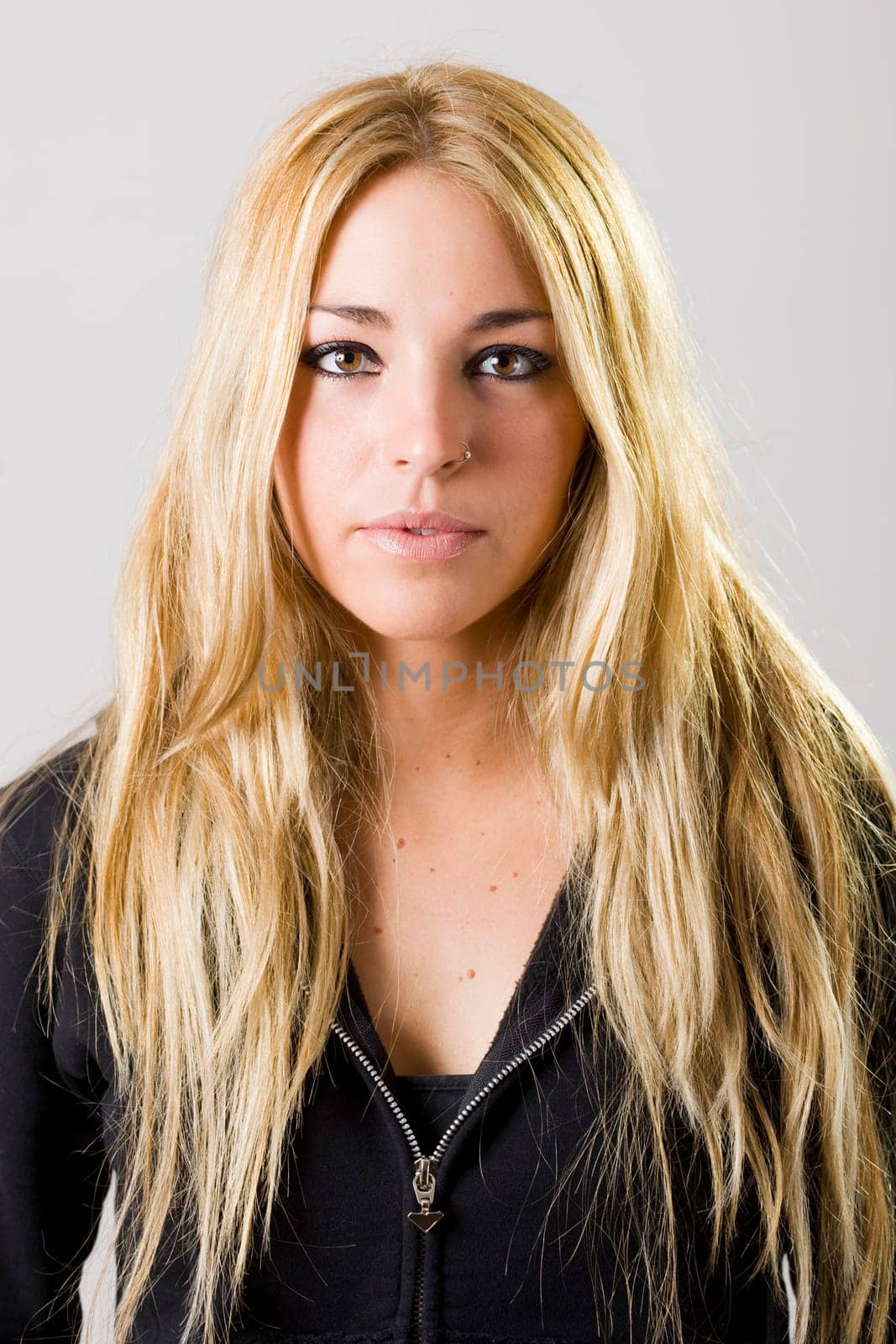 a portrait of a real beautiful young surprised girl