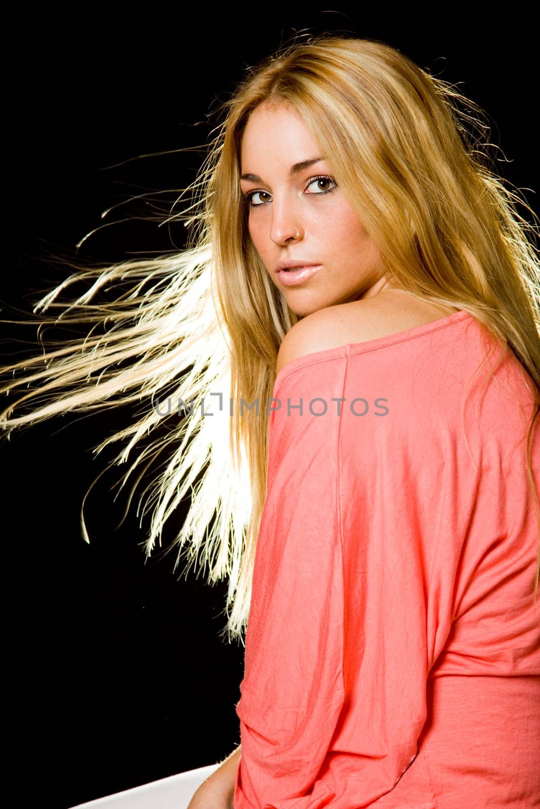 a portrait of a real beautiful young surprised girl