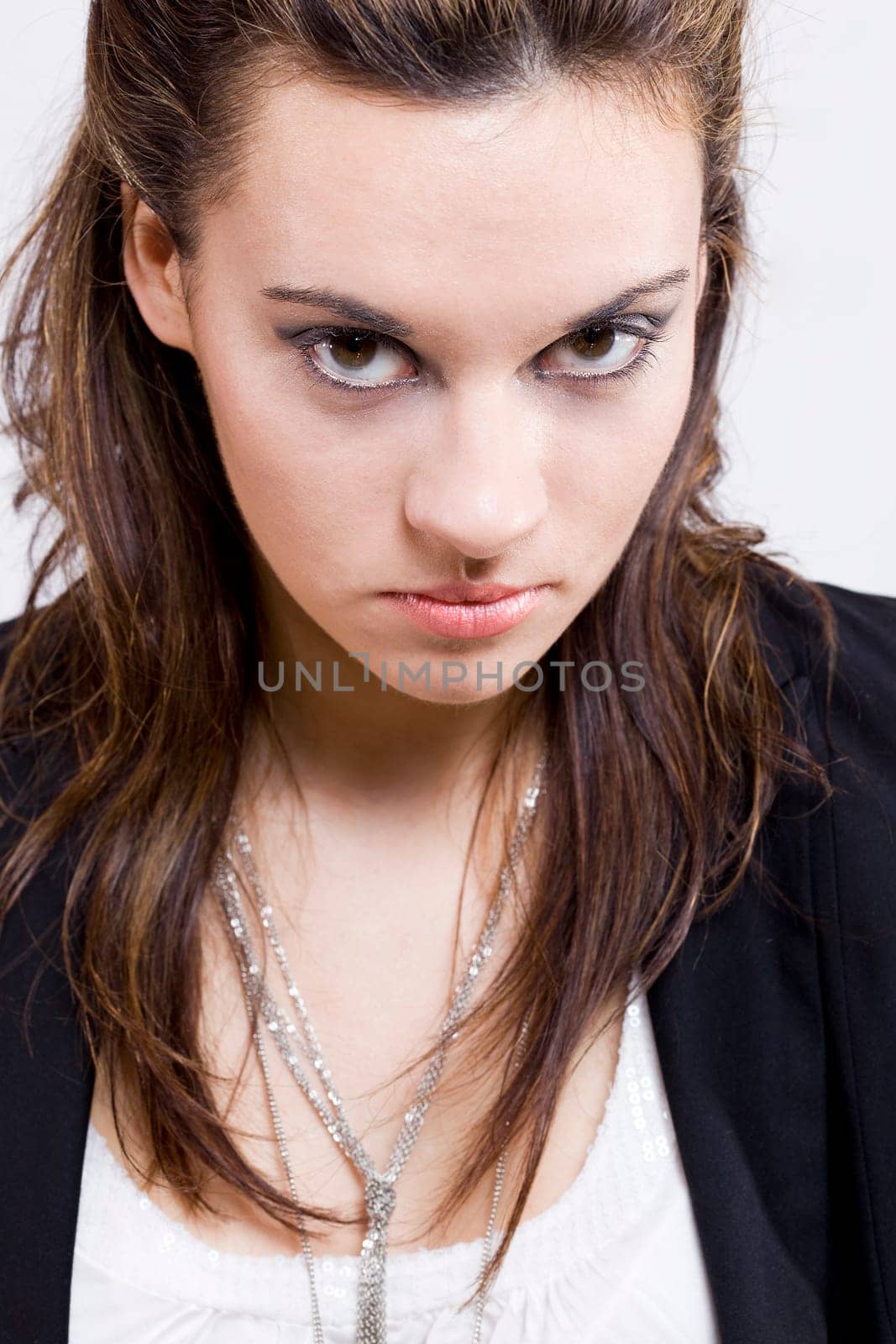 a portrait of a real beautiful young surprised girl