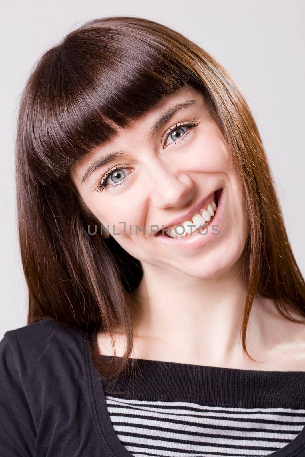 image of a young beautiful real brunete girl smiling