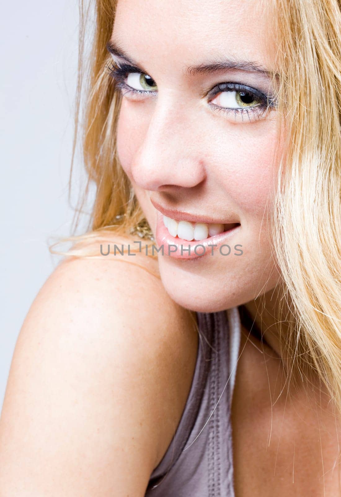 a portrait of a real beautiful young surprised girl