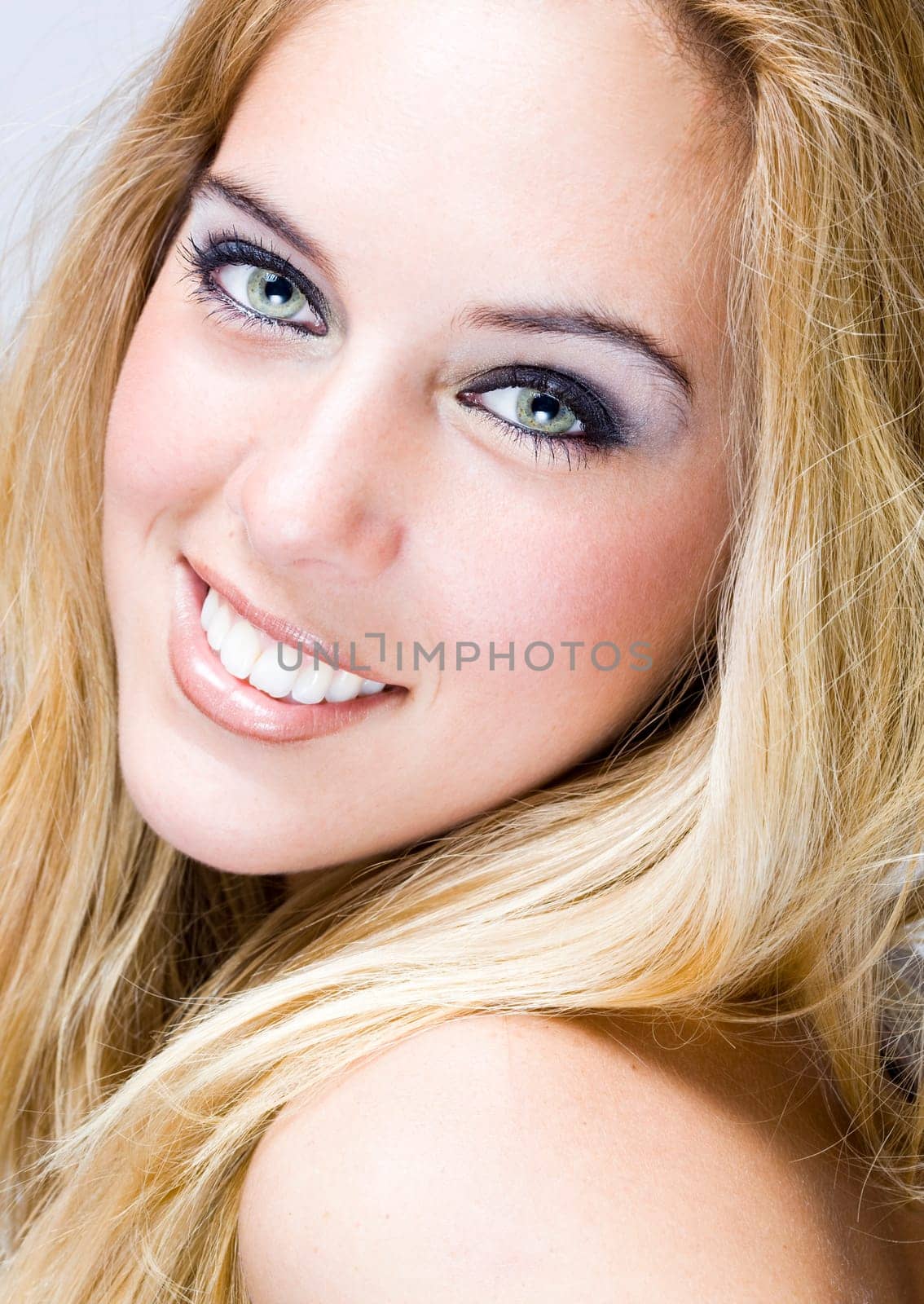 a portrait of a real beautiful young surprised girl
