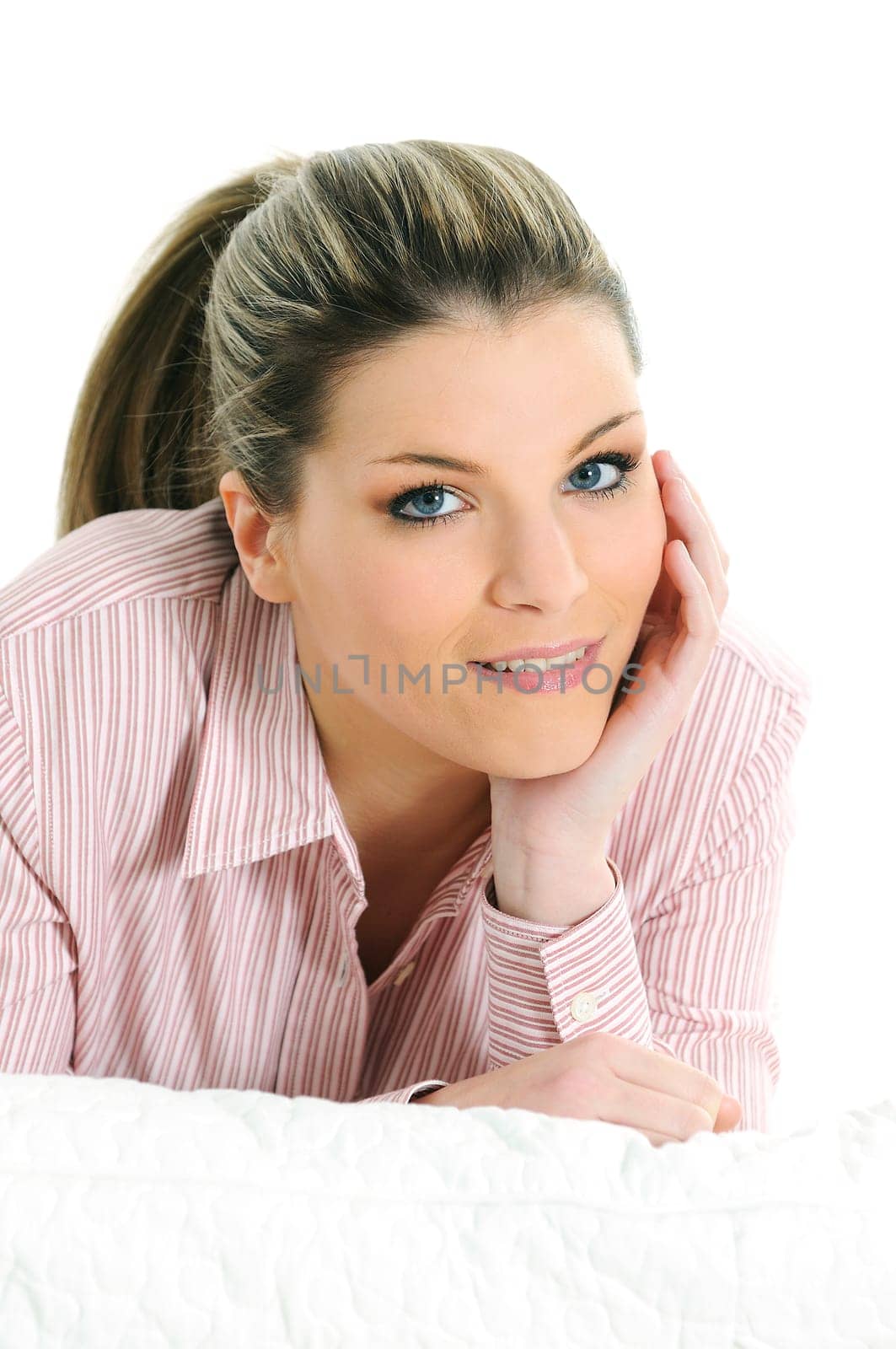 Beautiful blond woman relaxing at home
