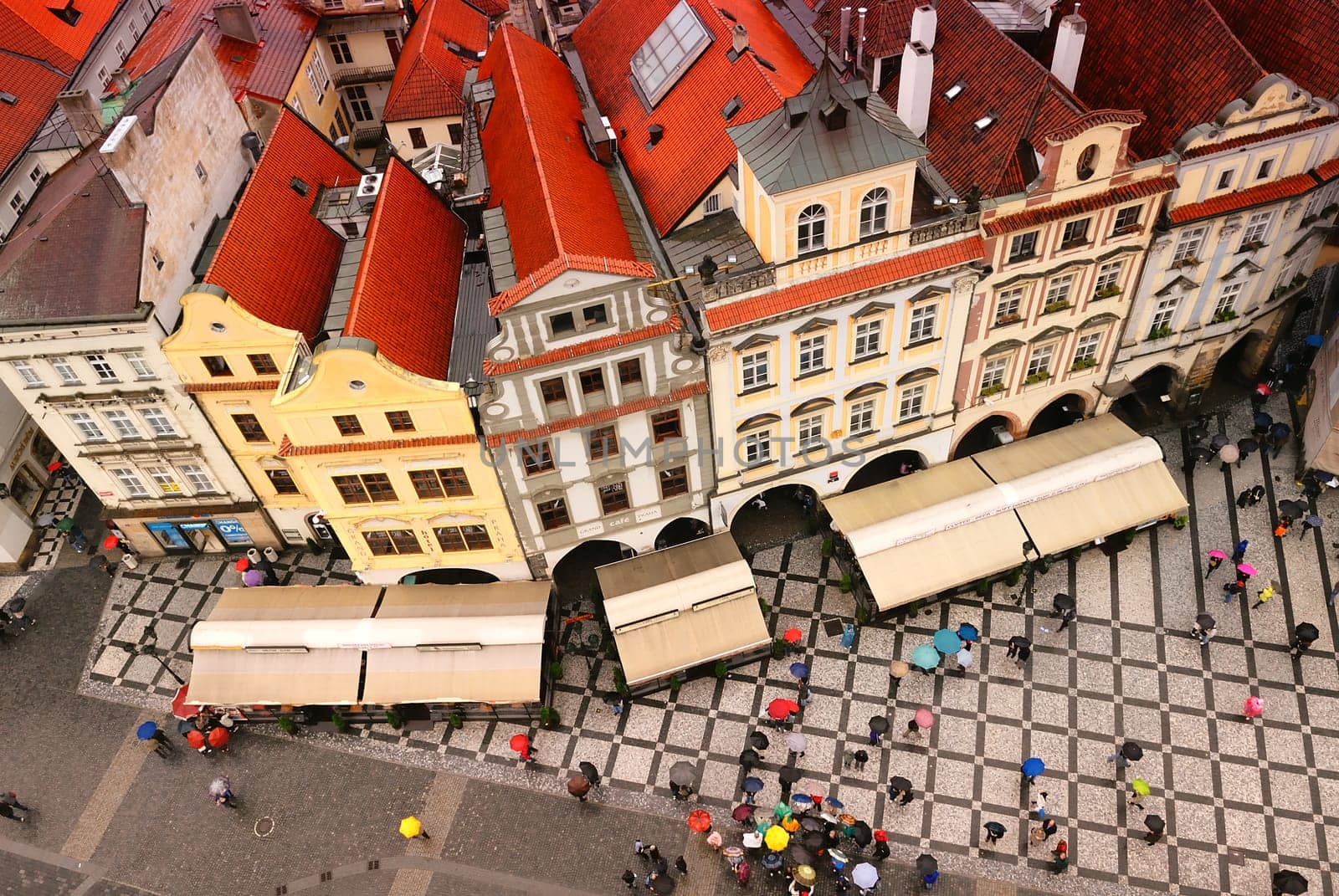 Stock Photo: crowded square in the rain, Prague city, Czechia