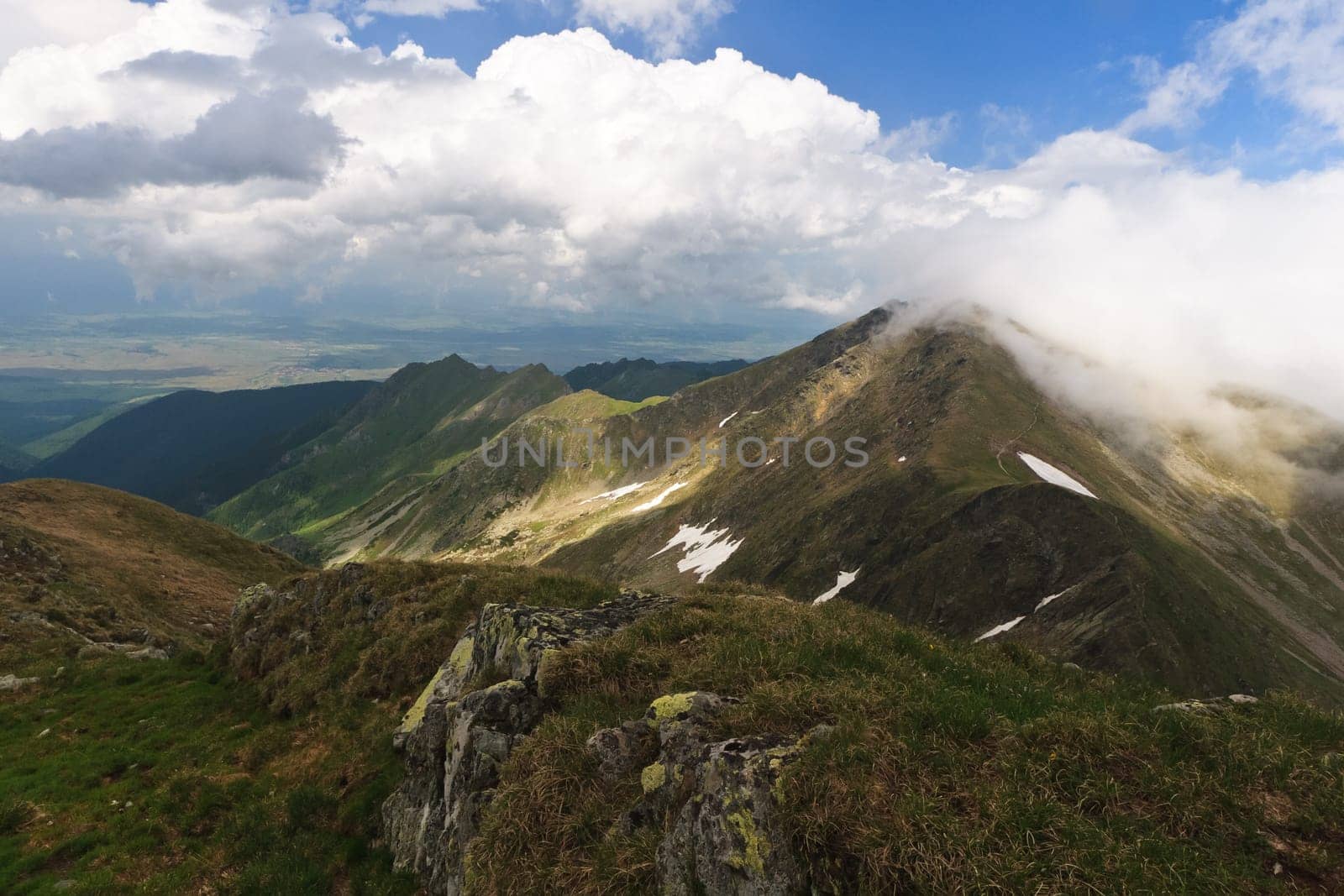 a mountain range and a sky with clouds, Fagaras Mountains, Romania