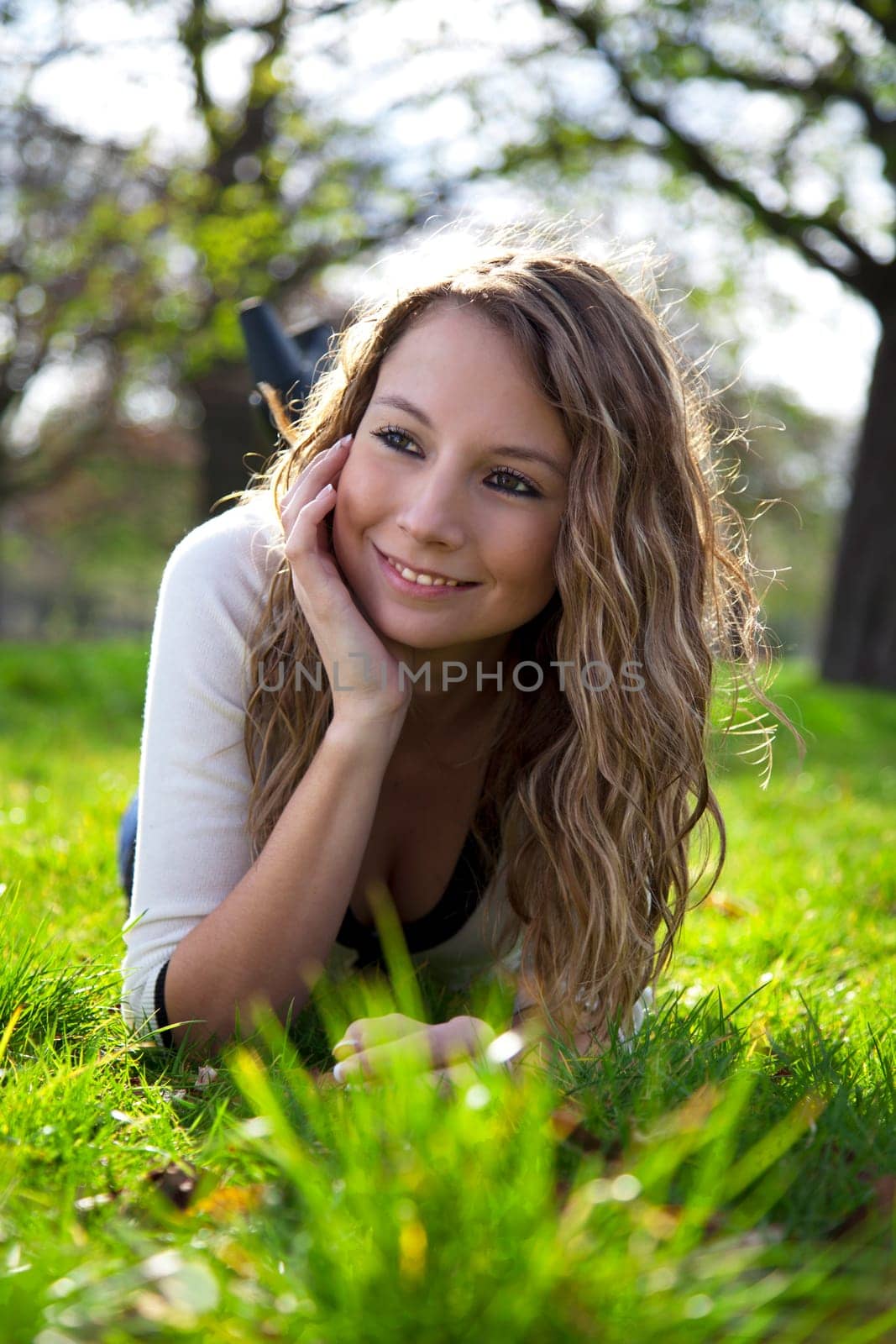Young woman relaxing on a sunny day in park