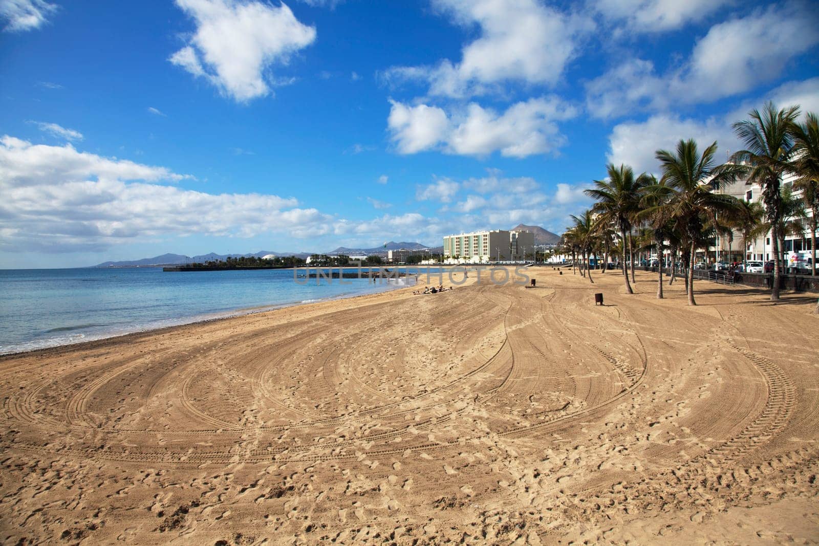 Fantastic image of a town beach with blue sky