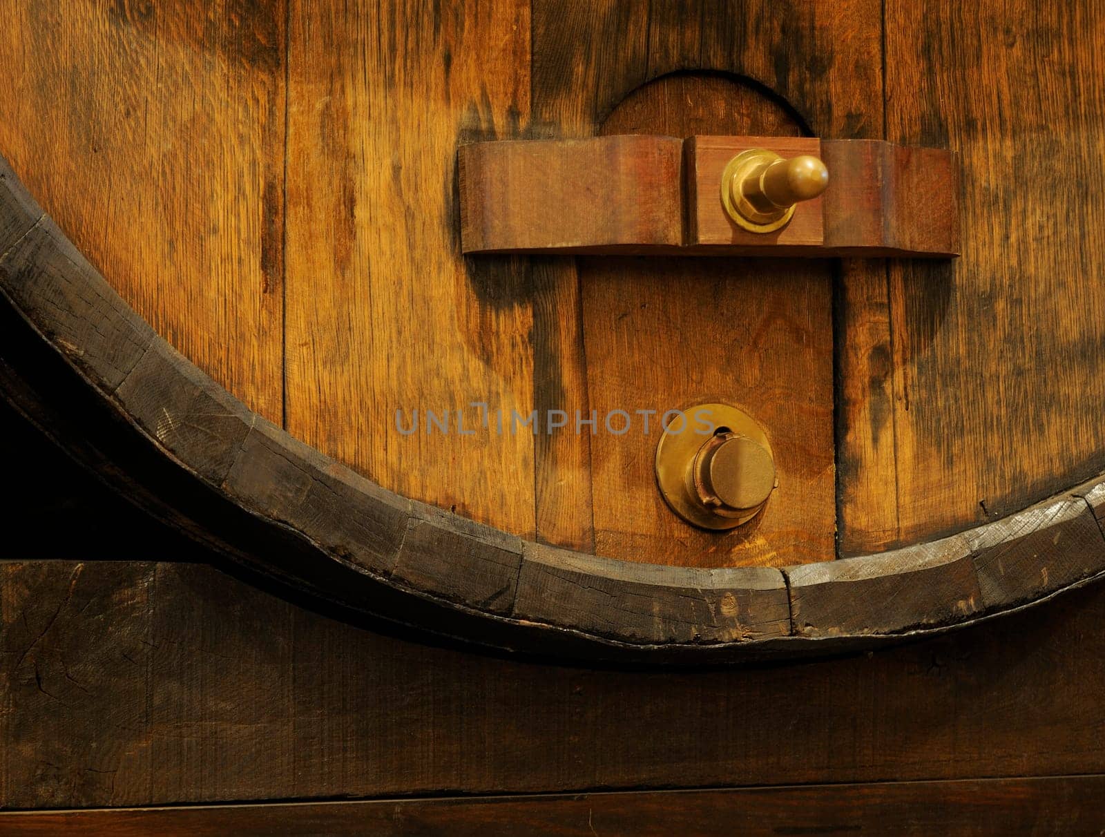 Wine barrels stacked for aging new wine.