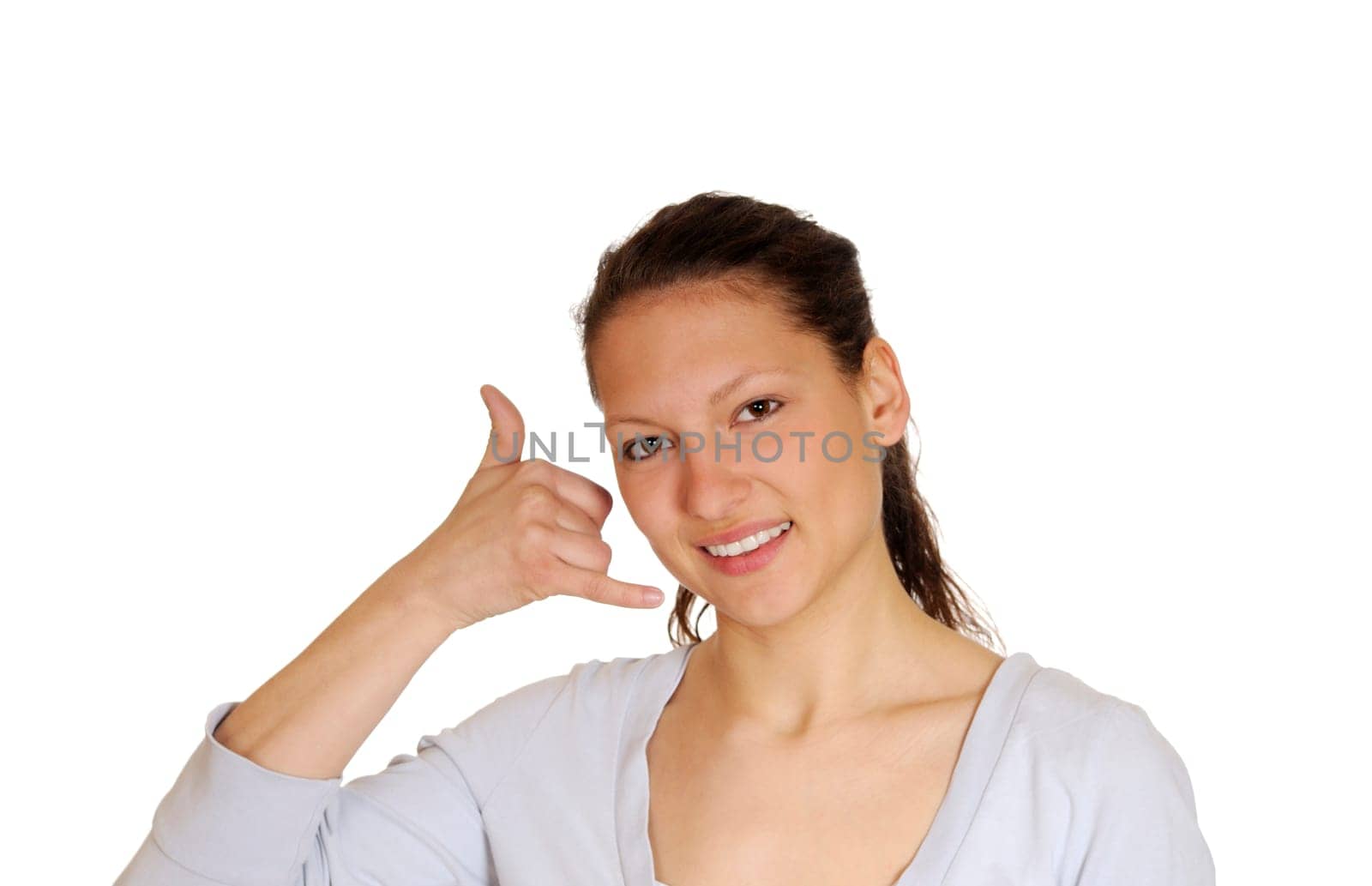 Young woman showing phone sign