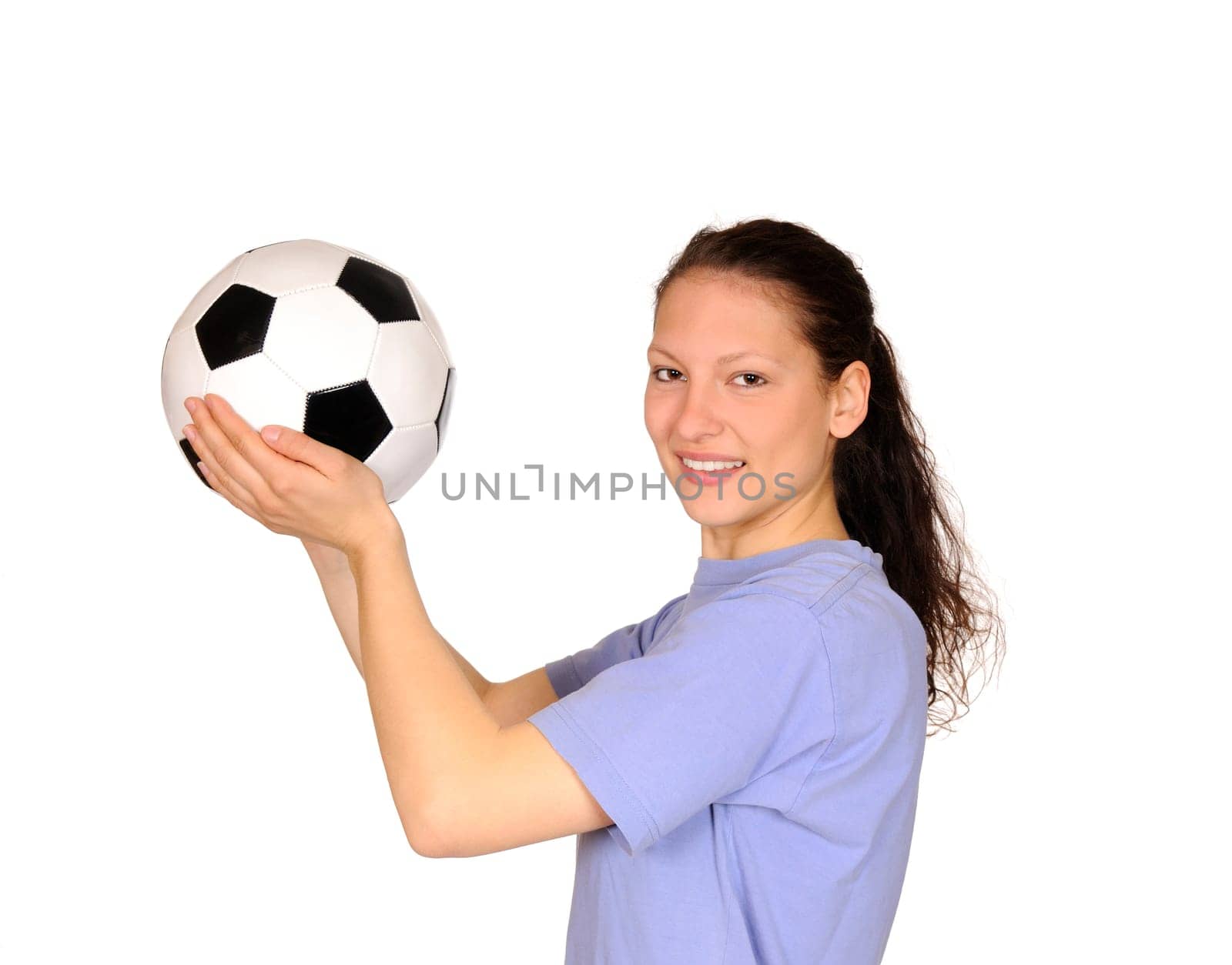 Young woman with soccer ball