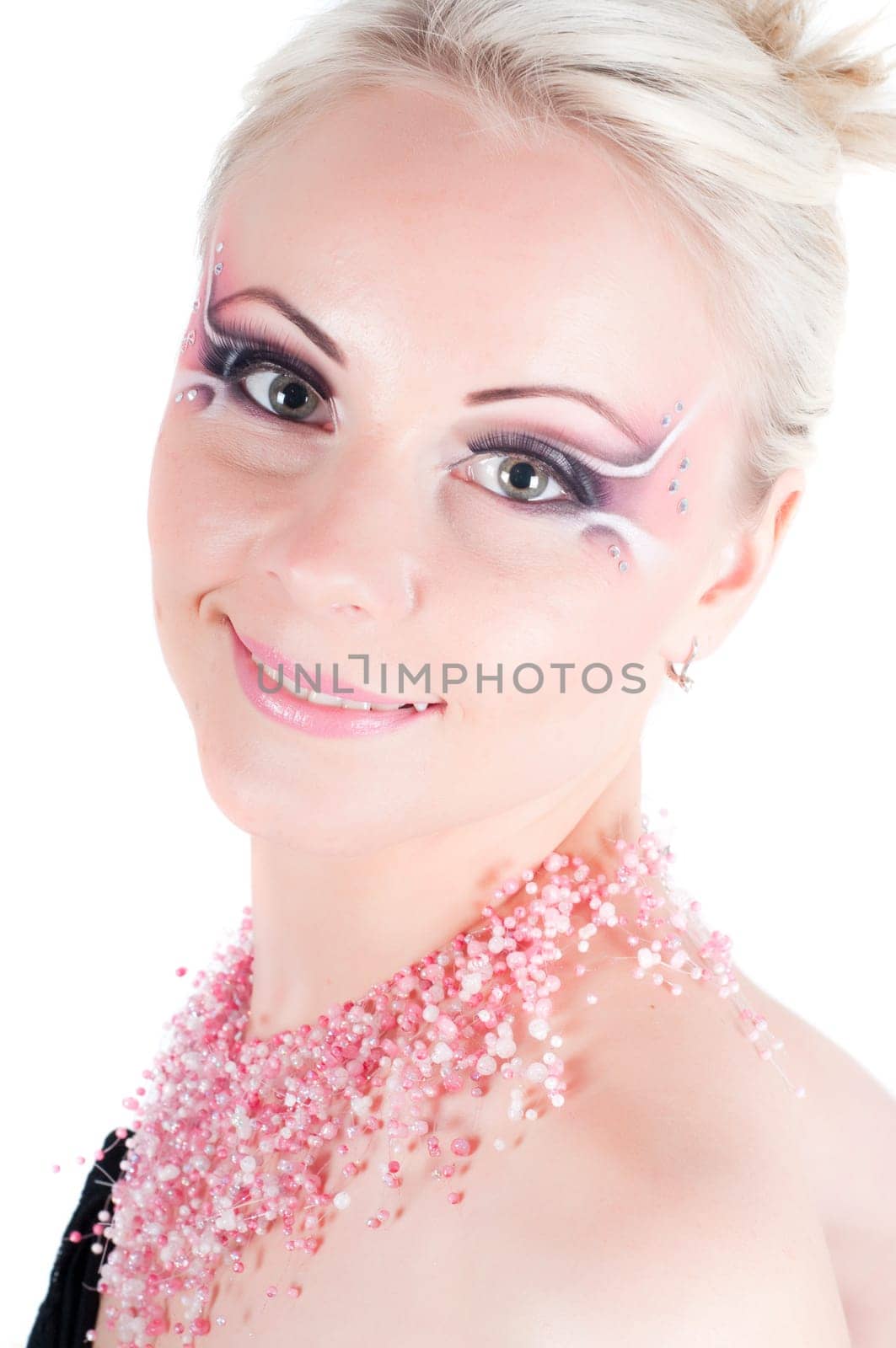 Studio shot of woman with face art isolated on white