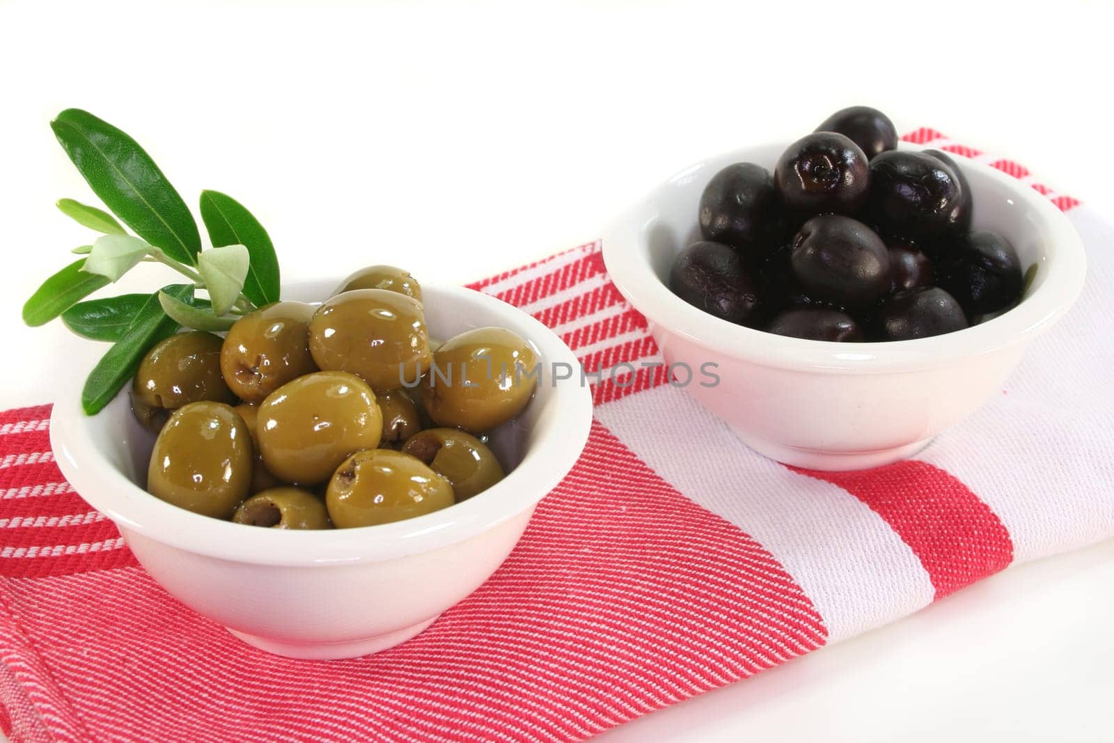 black and green olives and an olive branch