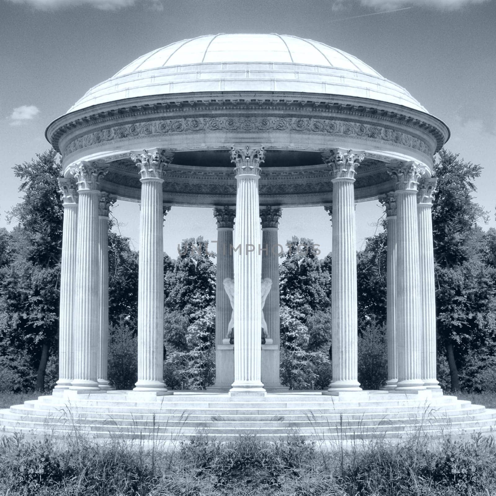 Classical circular temple in a garden - High dynamic range HDR