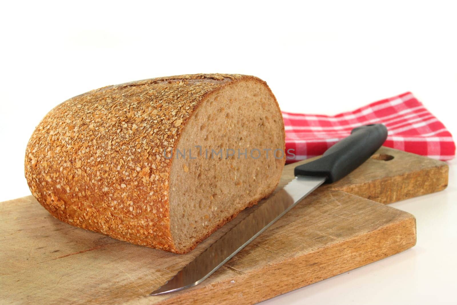 half a loaf of bread against a white background