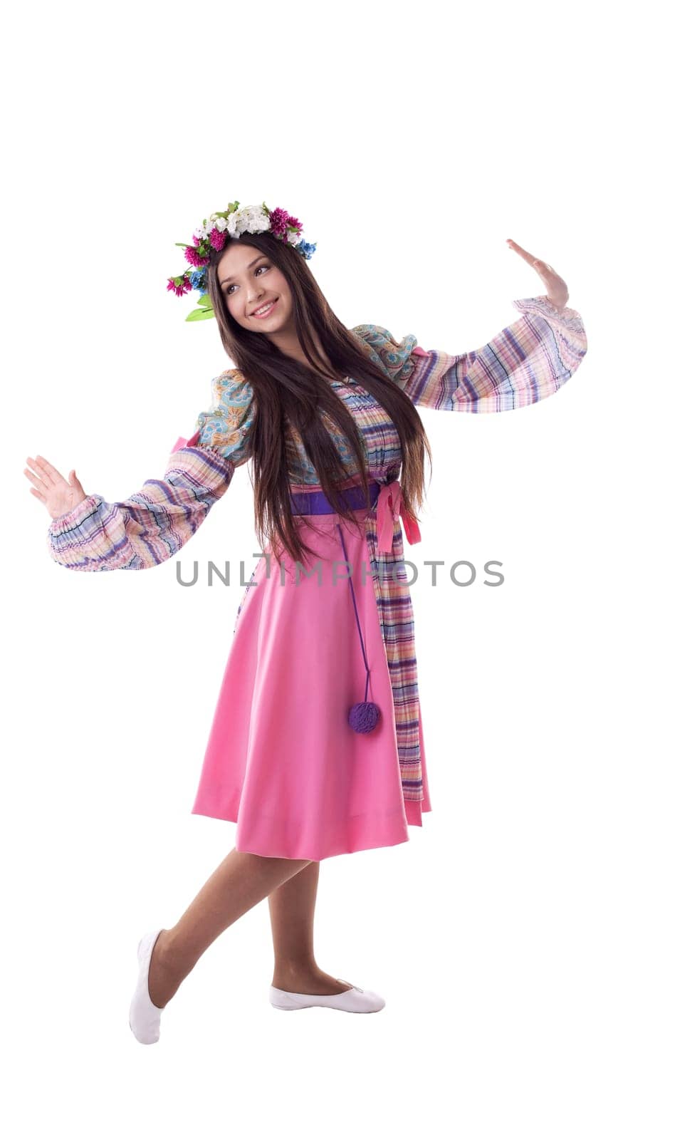 Beauty young girl with garland in traditional russian costume