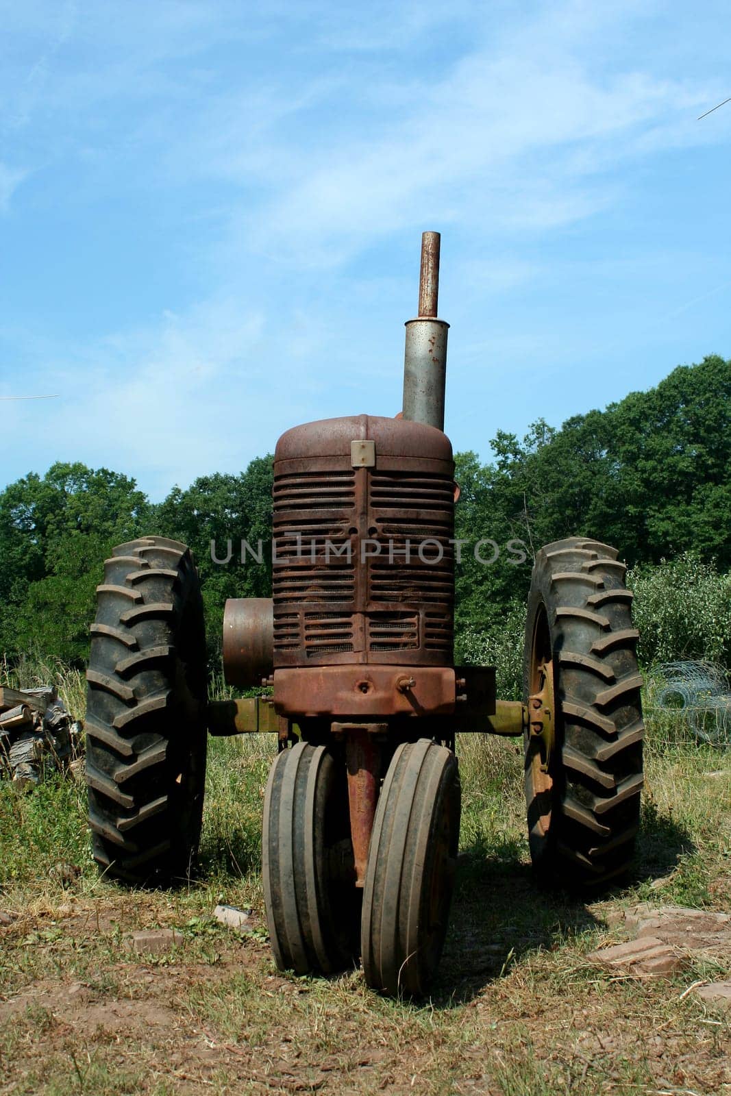 A Old rusty farm tractor