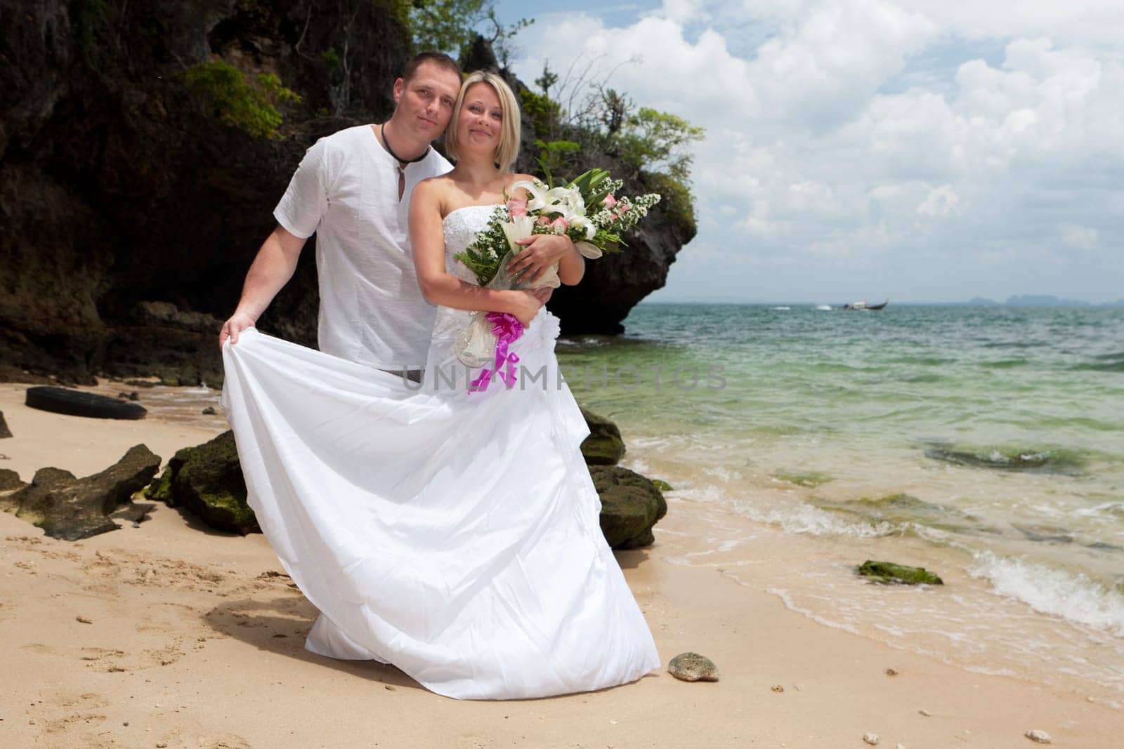 Wedding on the beach,in a wedding dress by the sea in Thailand