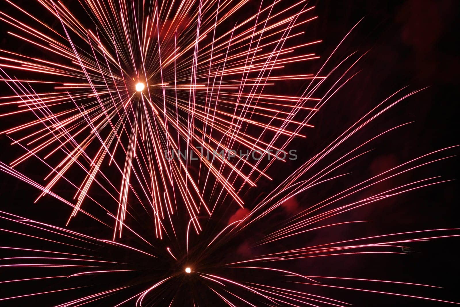 an image of exploding fireworks at night.