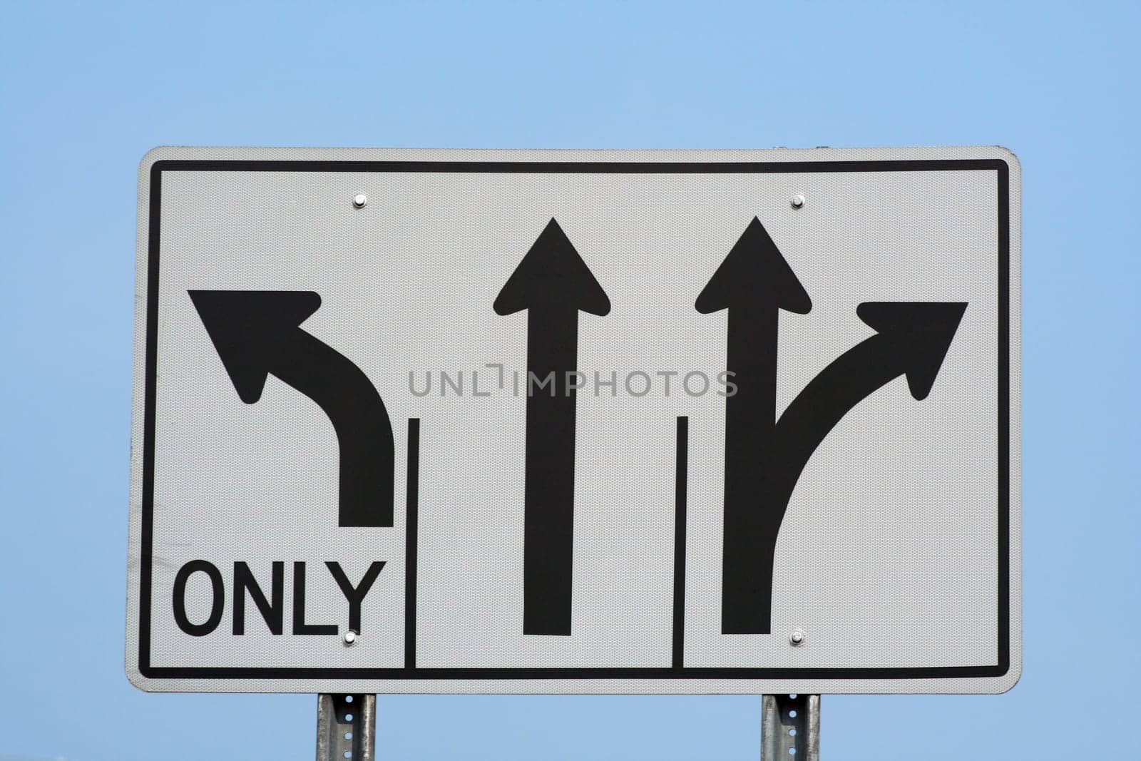 a sign with three arrows on it.