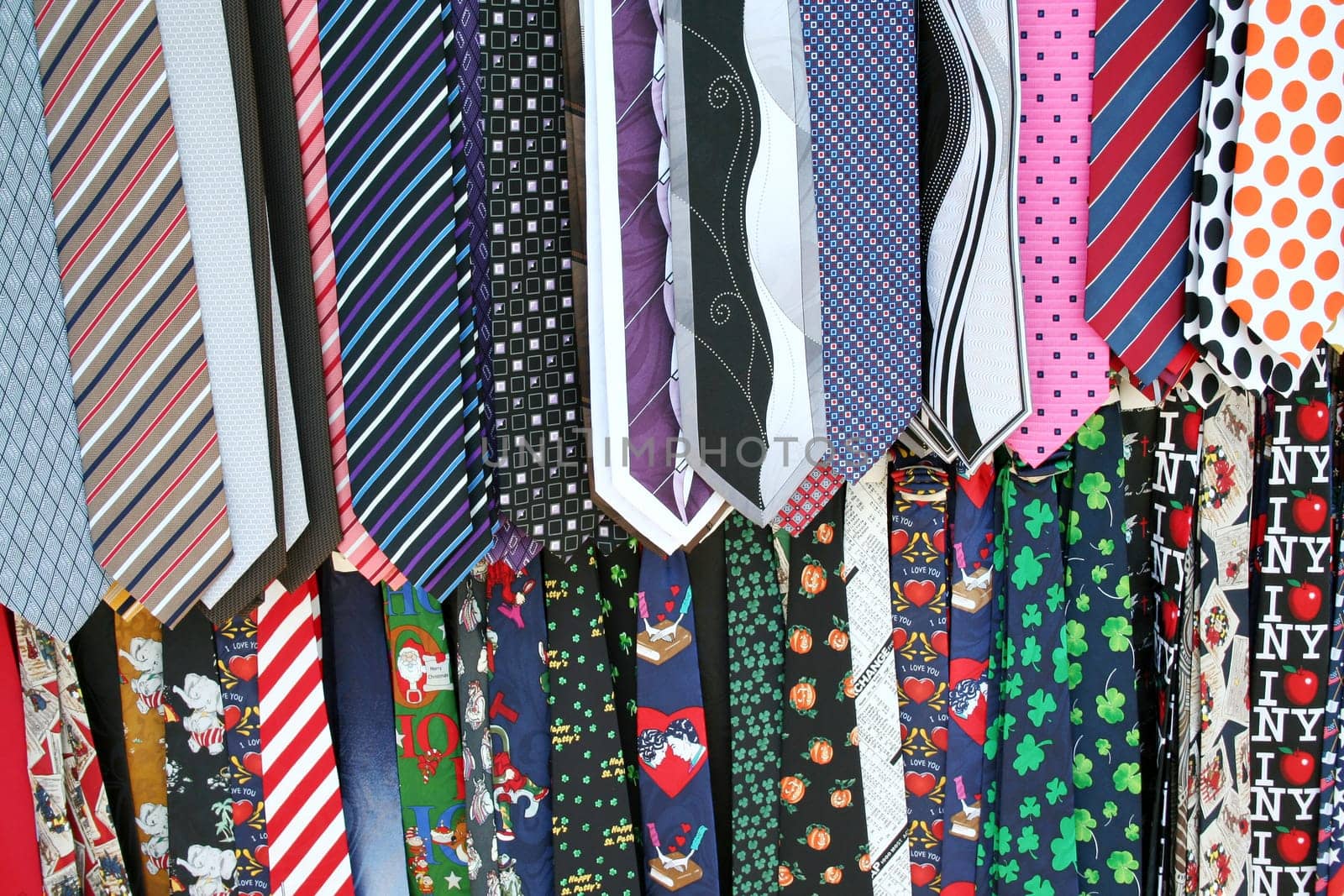 Hanging colorful Mens Neck Ties at the flea market