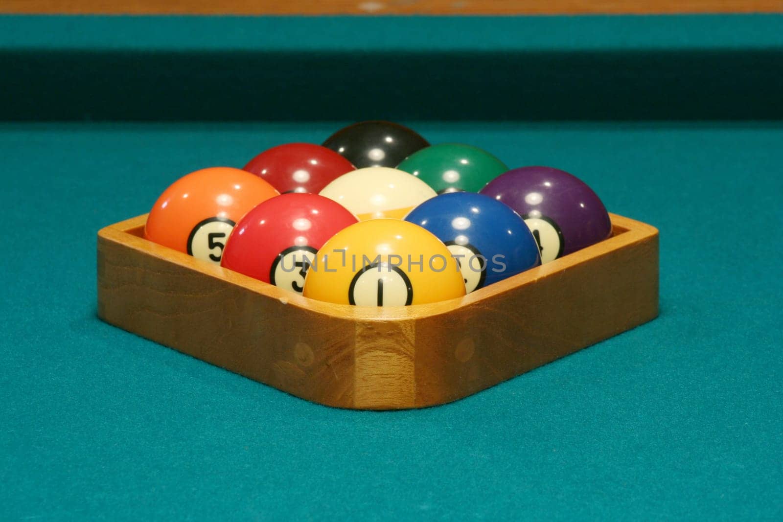 Racked balls set for a game of 9 ball