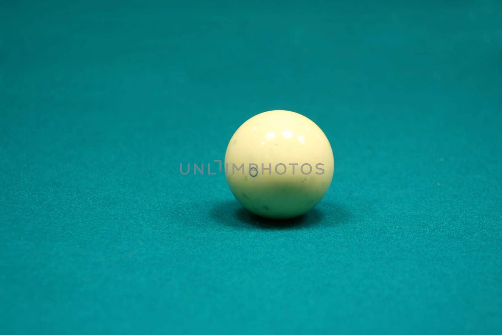 Cue ball on a green table