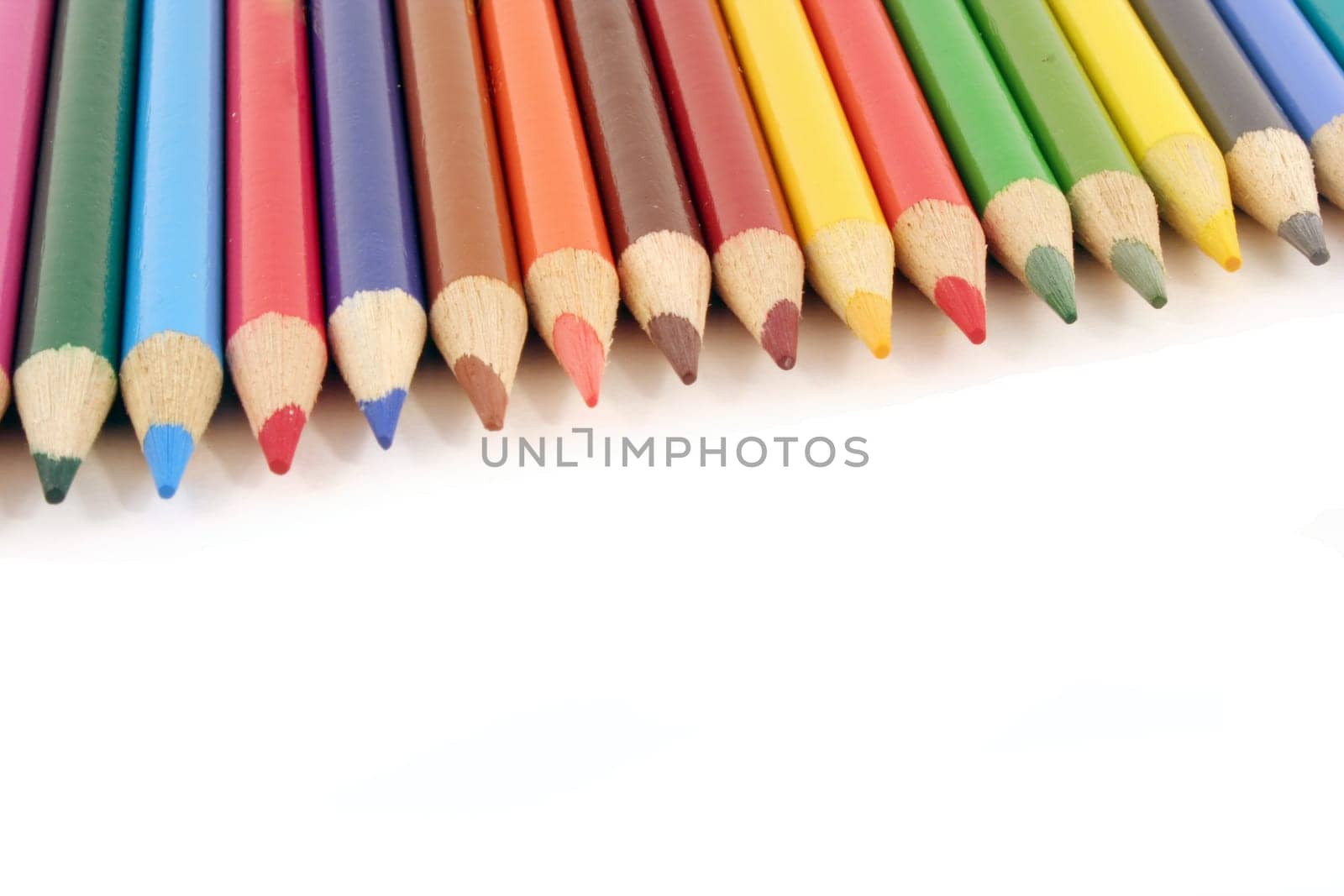 Colored pencils on a white background