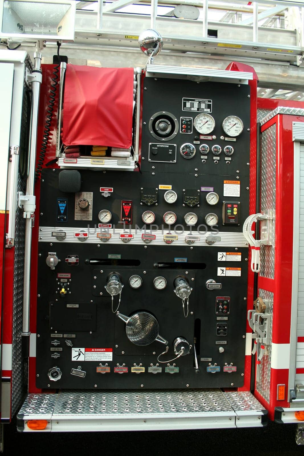 A Fire Truck controls parked outside a firehouse