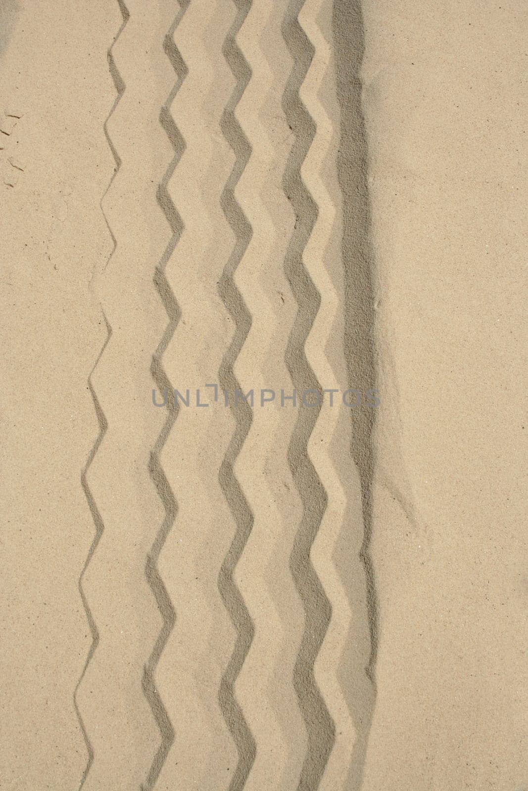 Rough sand meeting smooth sand