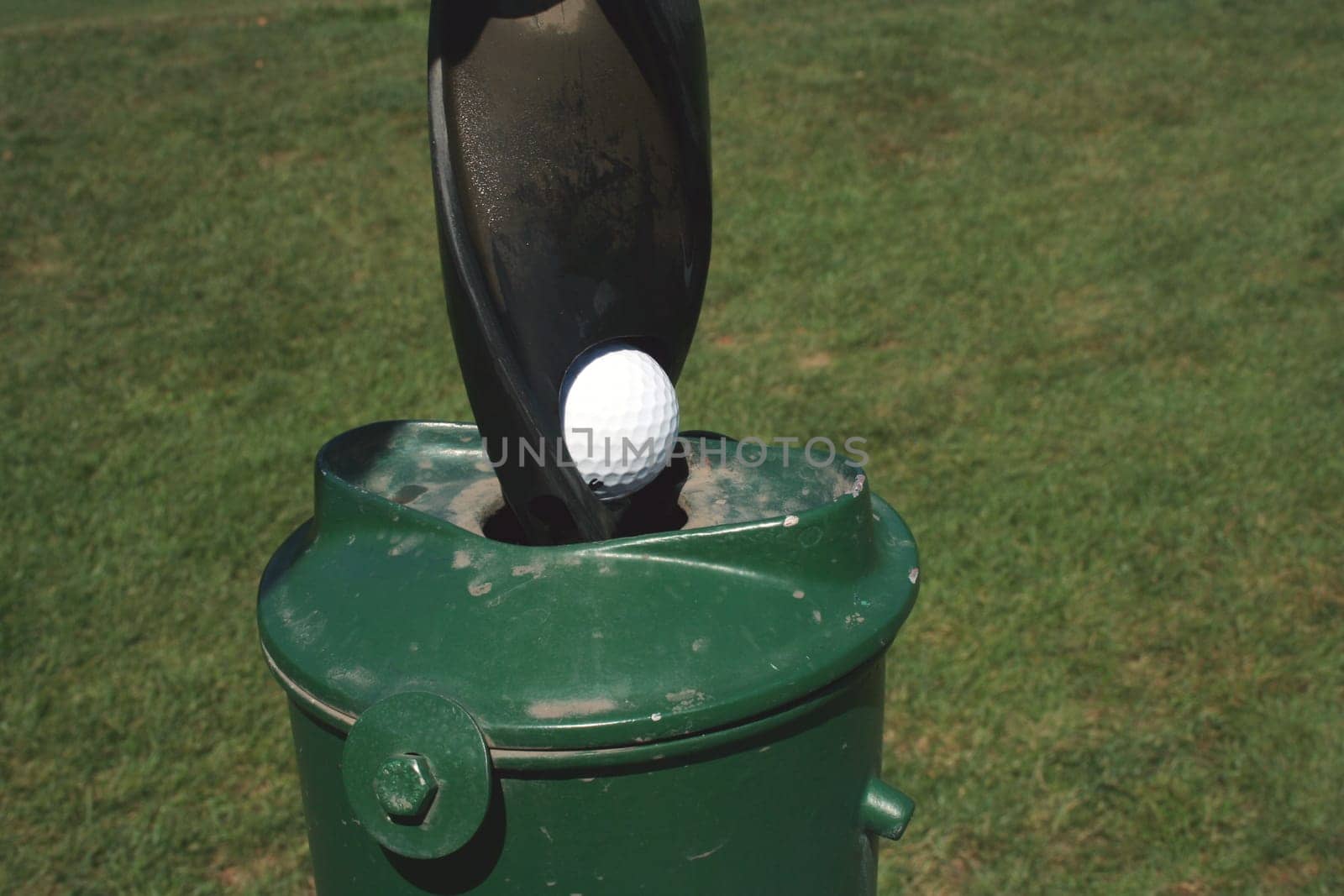 A Golf Ball Washer with golf ball